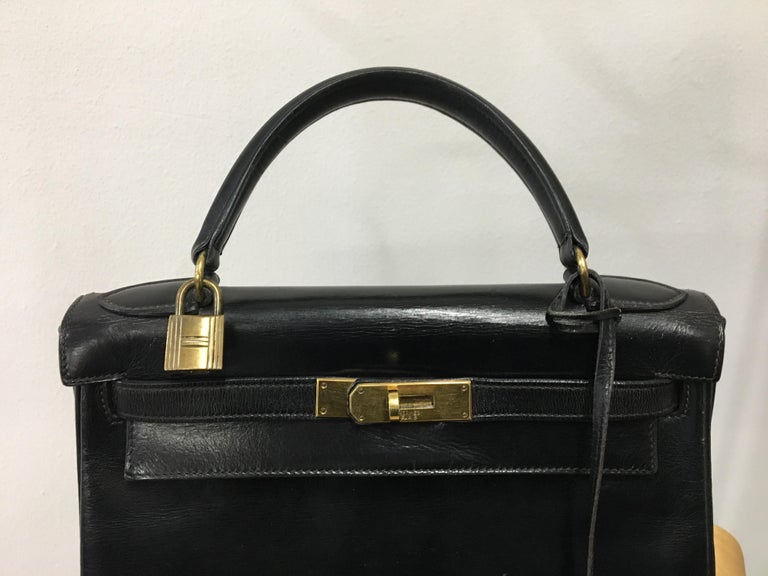 Hermès vintage 1950&#39;s black leather Kelly bag. For Sale at 1stdibs