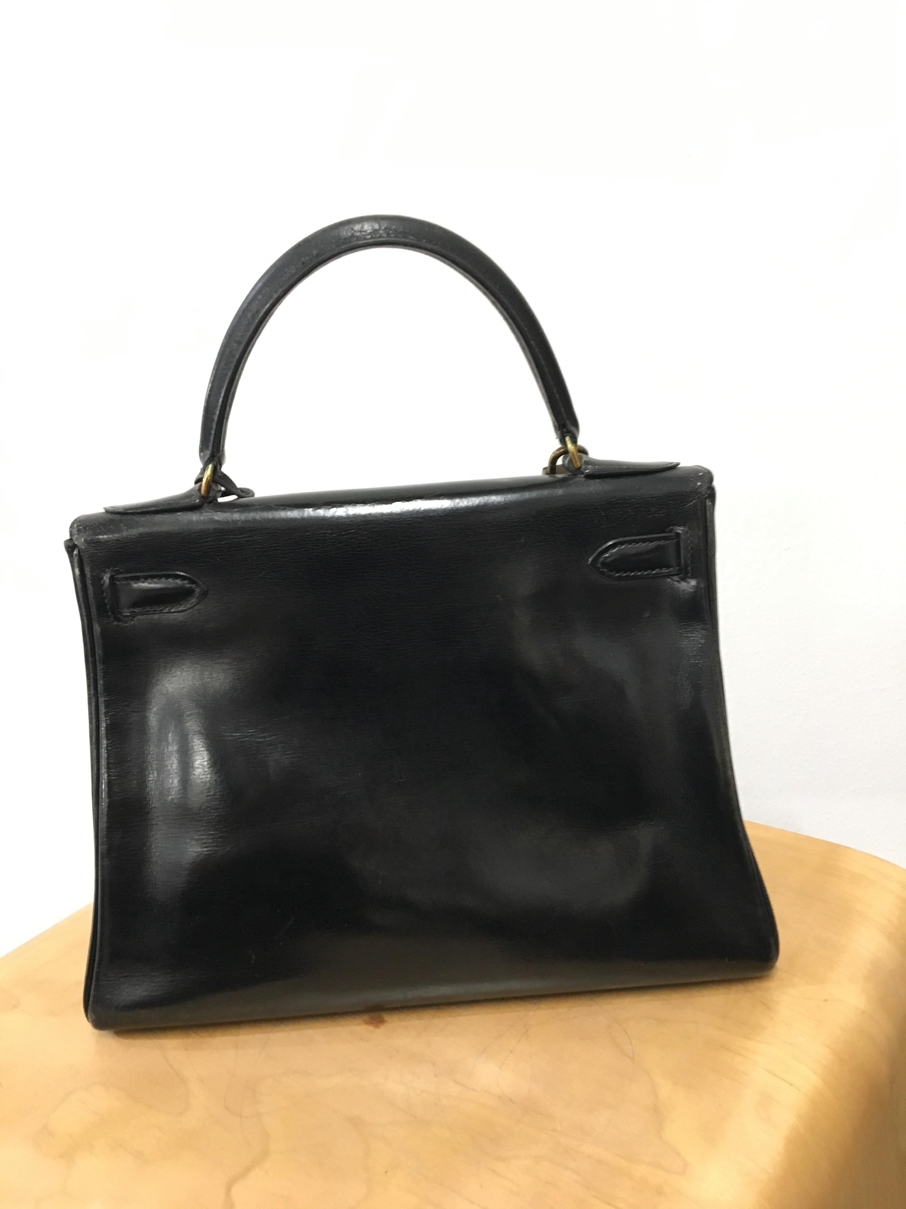 Women's  Hermès vintage 1950's black leather Kelly bag. For Sale