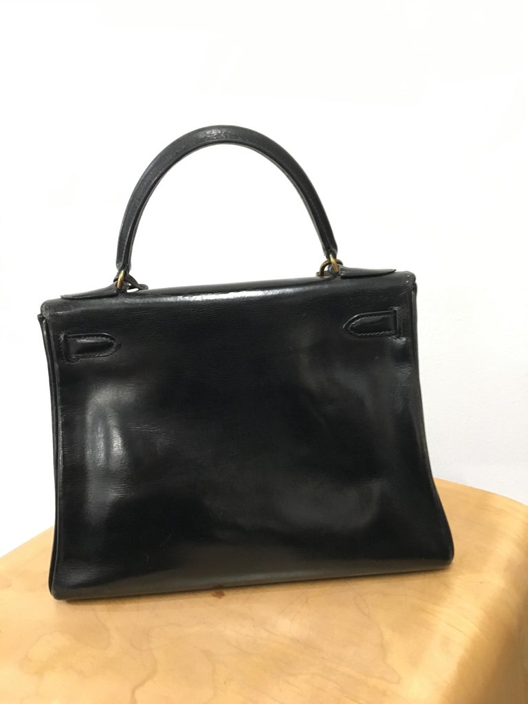 Hermès vintage 1950's black leather Kelly bag. For Sale at 1stDibs