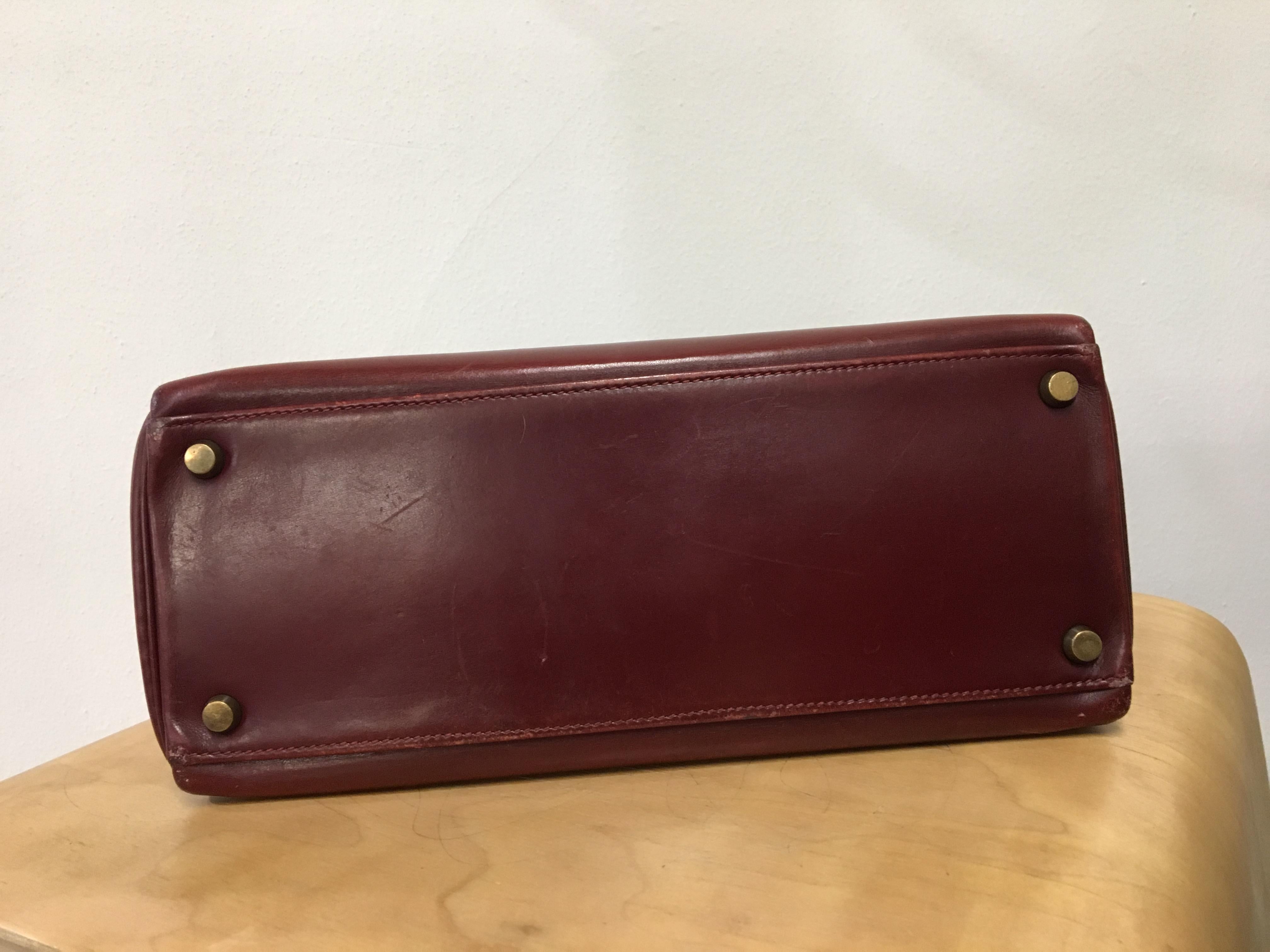 Brown  Hermès vintage 1950's marron/ burgundy leather Kelly bag.