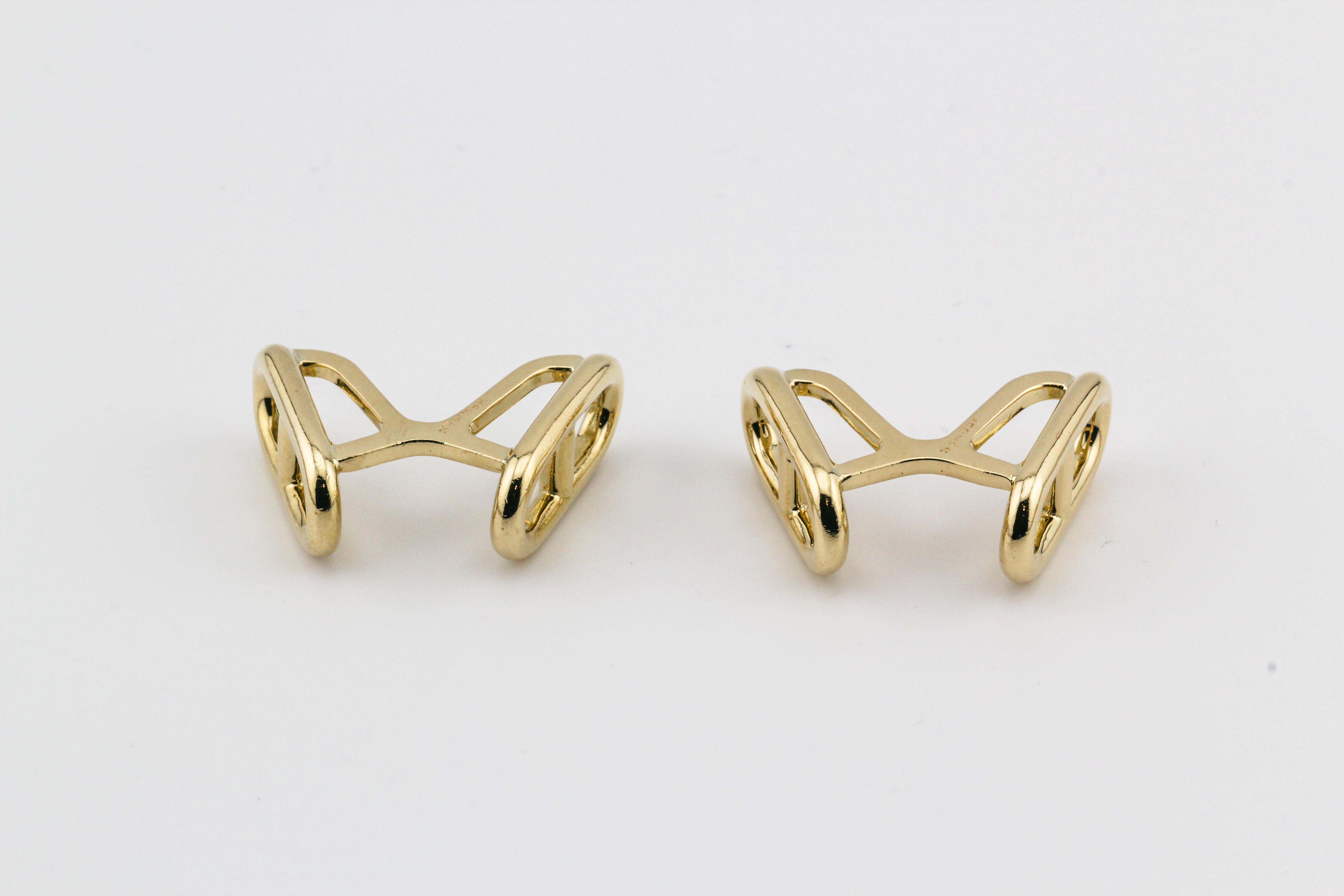 Step into the world of timeless elegance with the Hermes Vintage 1970s Chaine D'Ancre 18k Gold Cufflinks. These exquisite cufflinks, crafted in the 1970s by the renowned French luxury house Hermes, embody a perfect blend of sophistication and