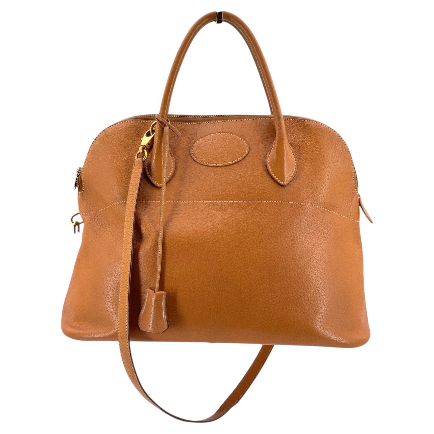 Bolso Bolide 35 de Hermes, de cuero vintage beige, con correa