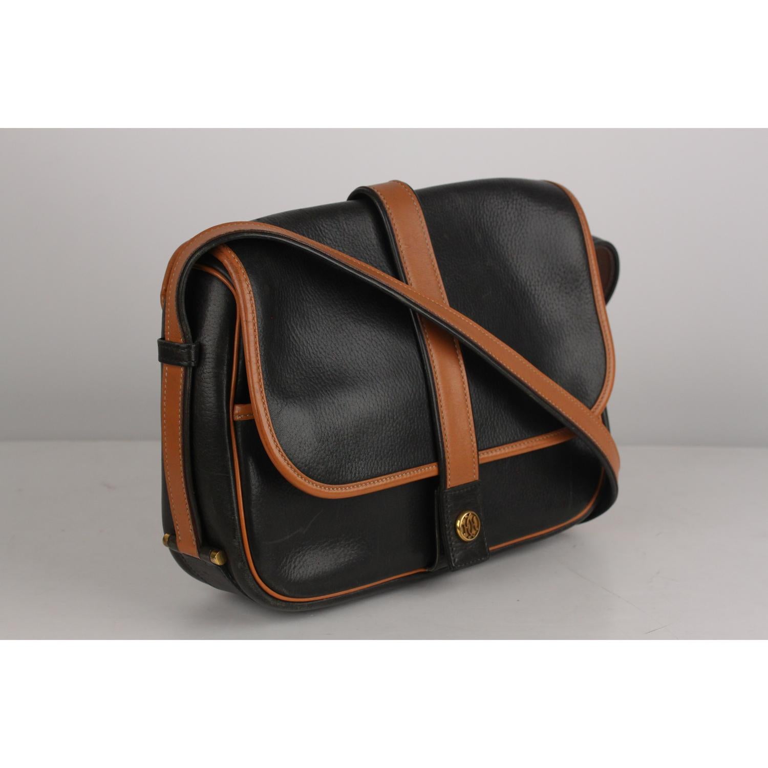 Women's Hermes Vintage Black and Tan Leather Noumea Shoulder Bag
