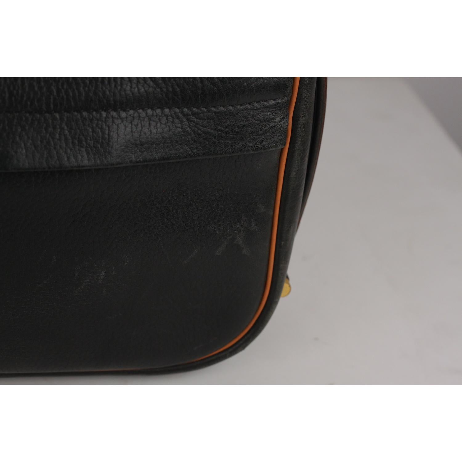 Hermes Vintage Black and Tan Leather Noumea Shoulder Bag 1