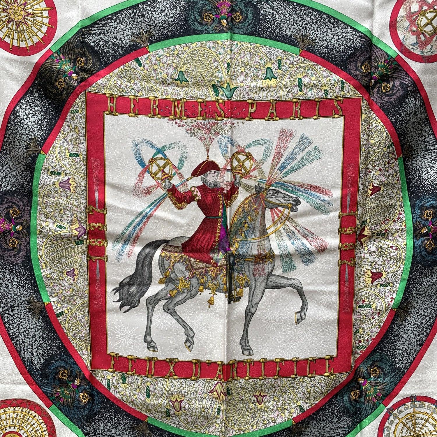 Stunning Hermes ' Feux d'Artifice' silk scarf designed by Michel Duchene and originally issued in 1987 for the 150th anniversary of the house. The knight in the center of the square corresponds to the equestrian statue that can be seen when you look