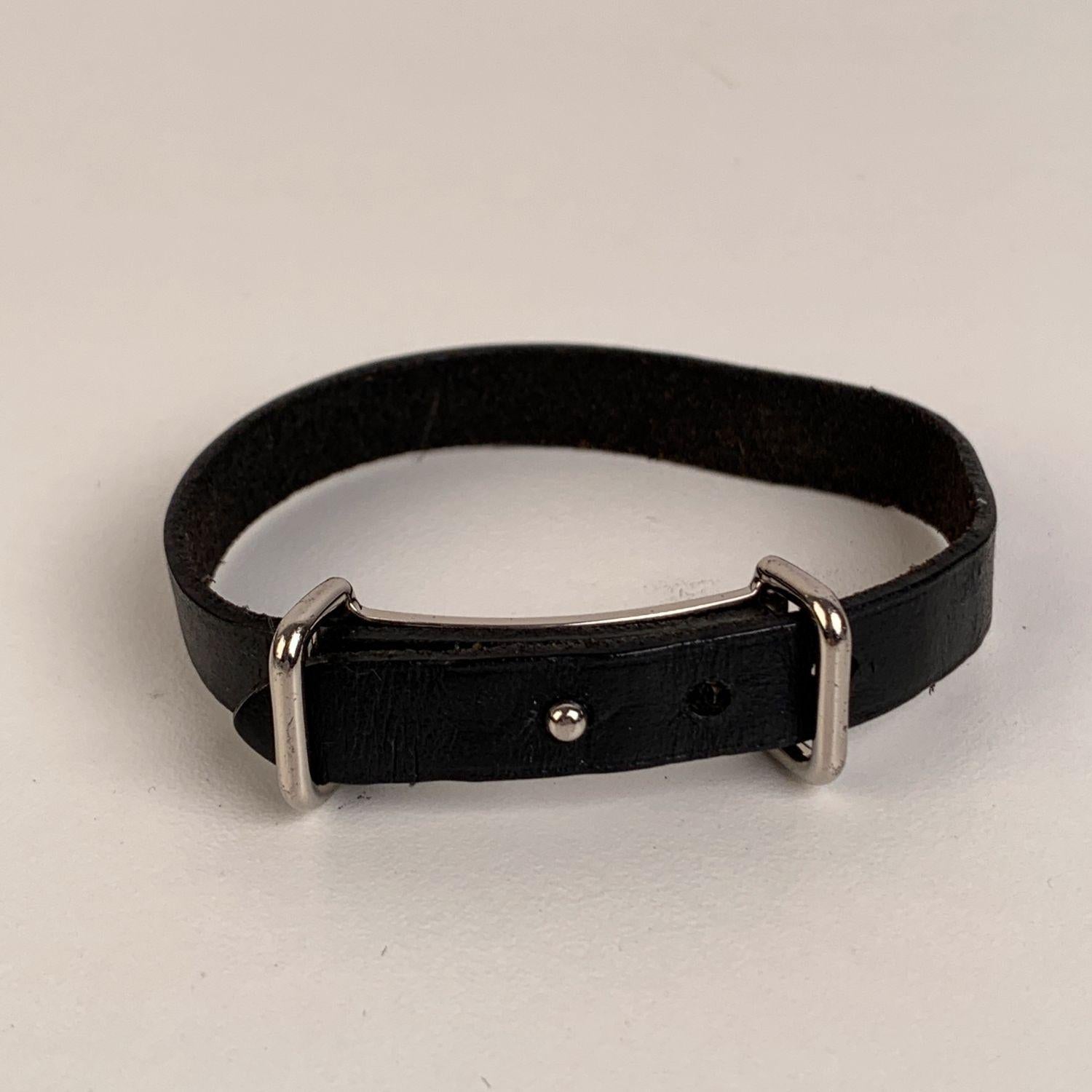 Vintage Hermes leather adjustable bracelet in black color. Palladium buckle.3 holes adjustment. For wrists up to 7 inches - 17,7 cm in circumference.. Total lenght of the strap: 9 inches - 22,8 cm. Signed 'Hermes Paris' on the back. 'Hermes'