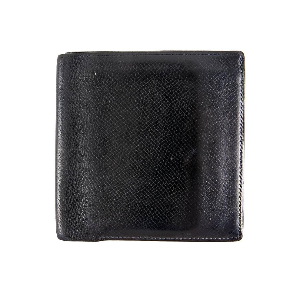 Timeless HERMES card holder, very practical with its 10 cards slots and 2 flat pockets ( for notes). Slights signs of wear, the leather is gently soften but in good condition due to his age. Square size (10 x 10 cm), very practical wise for men's