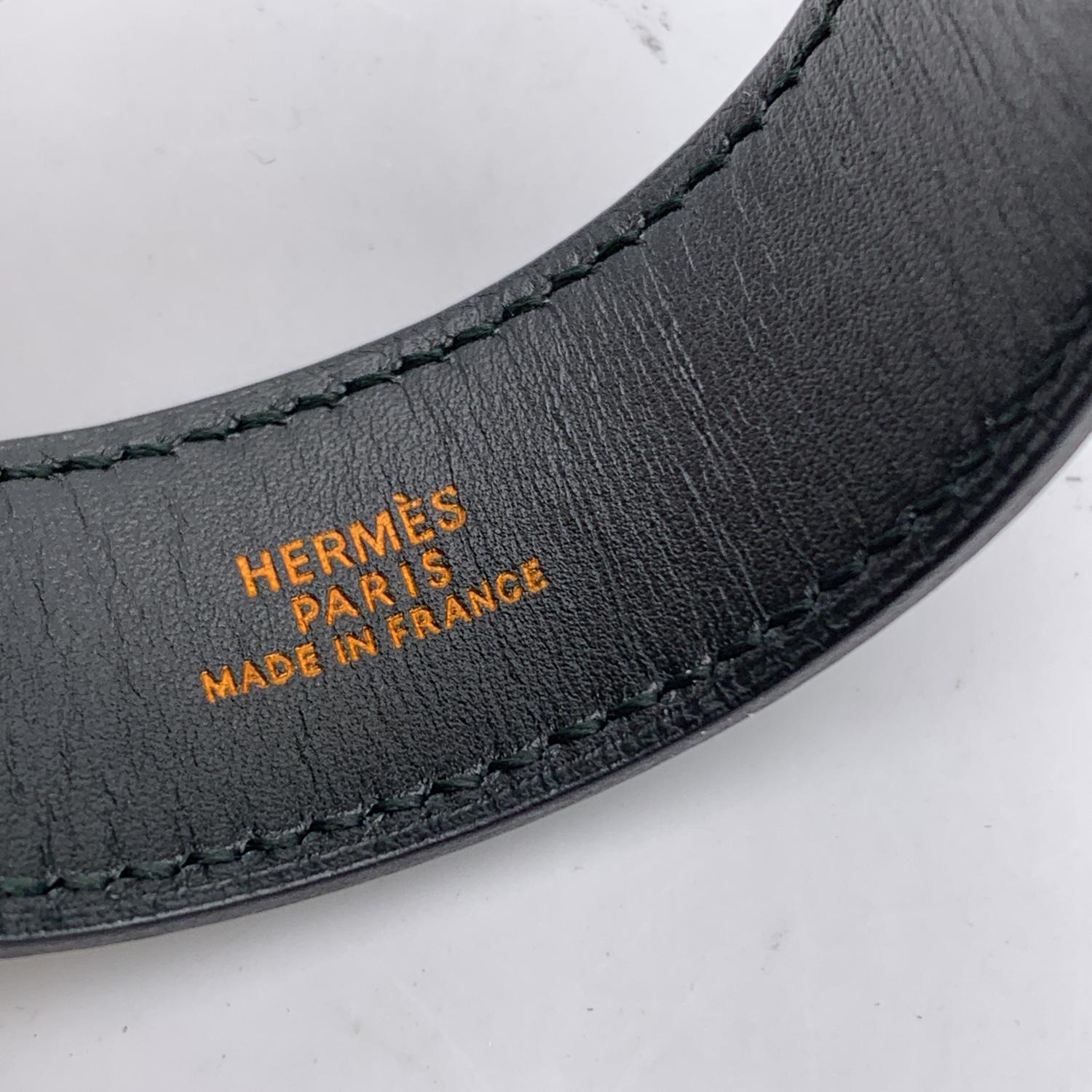 Vintage Hermes leather bracelet in black color. Gold buckle. For wrists up to 6 inches - 15cm in circumference. Signed 'Hermes' hardware. 'Hermes Paris - made in France' embossed inside the bracelet. Blind stamp is a B encased in a Square (year of
