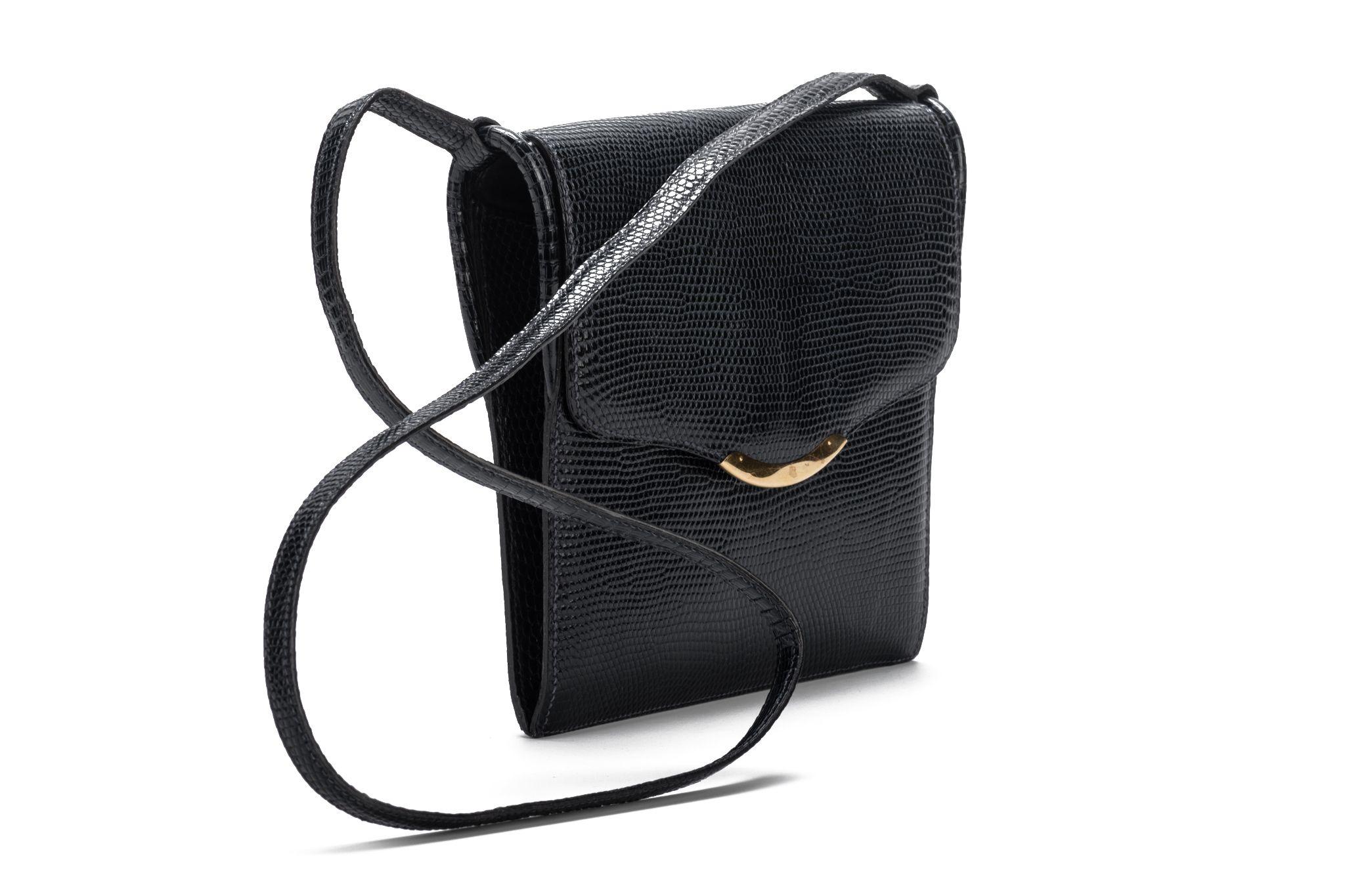 Hermes vintage black lizard shoulder bag with gold tone hardware. Shoulder drop 17