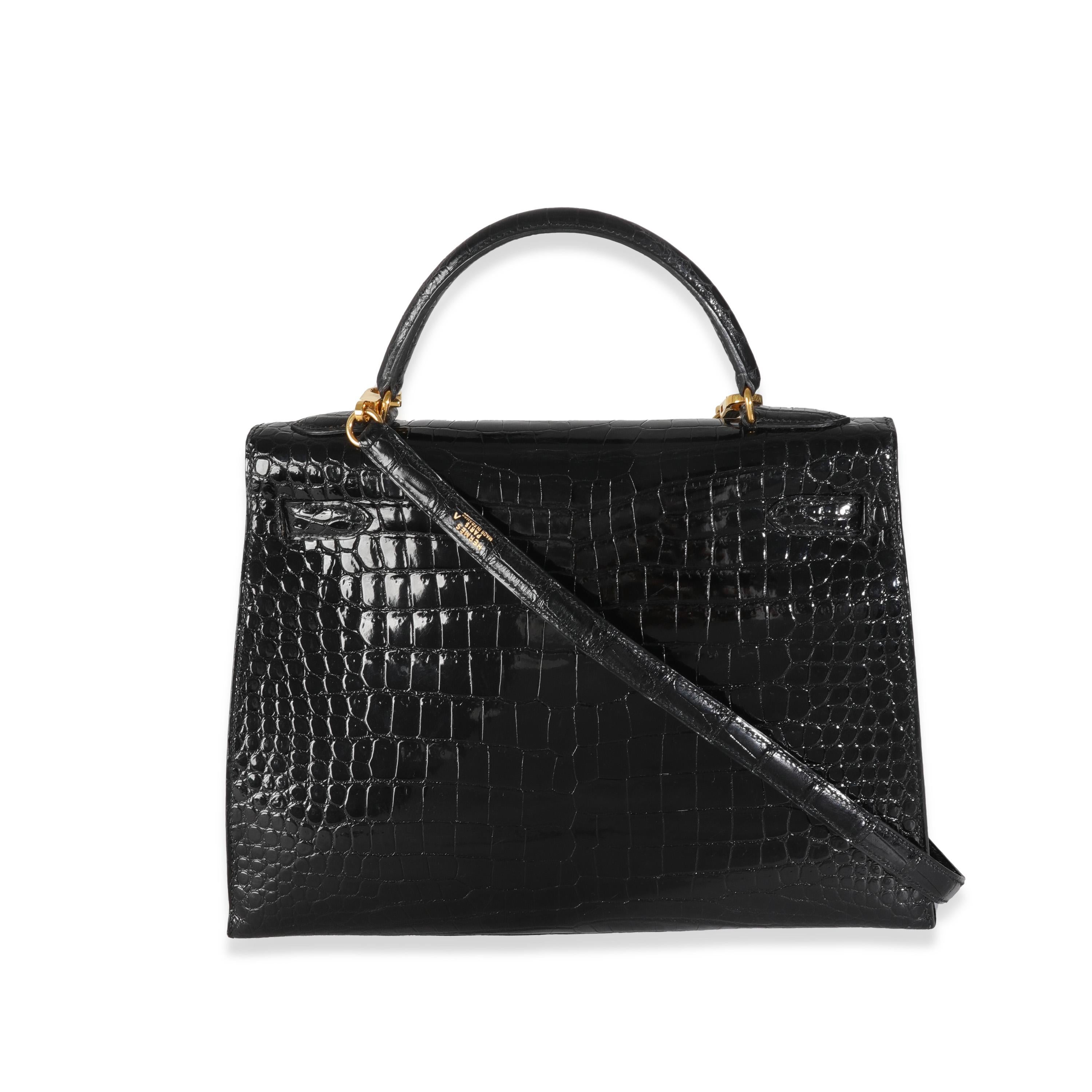 Listing Title: Hermès Vintage Black Porosus Crocodile Sellier Kelly 32 GHW
SKU: Z144559
Condition: Pre-owned 
Condition Description: Officially renamed in 1977, the Kelly tote bag from Hermès was originally called the Sac à Dépêches (which
