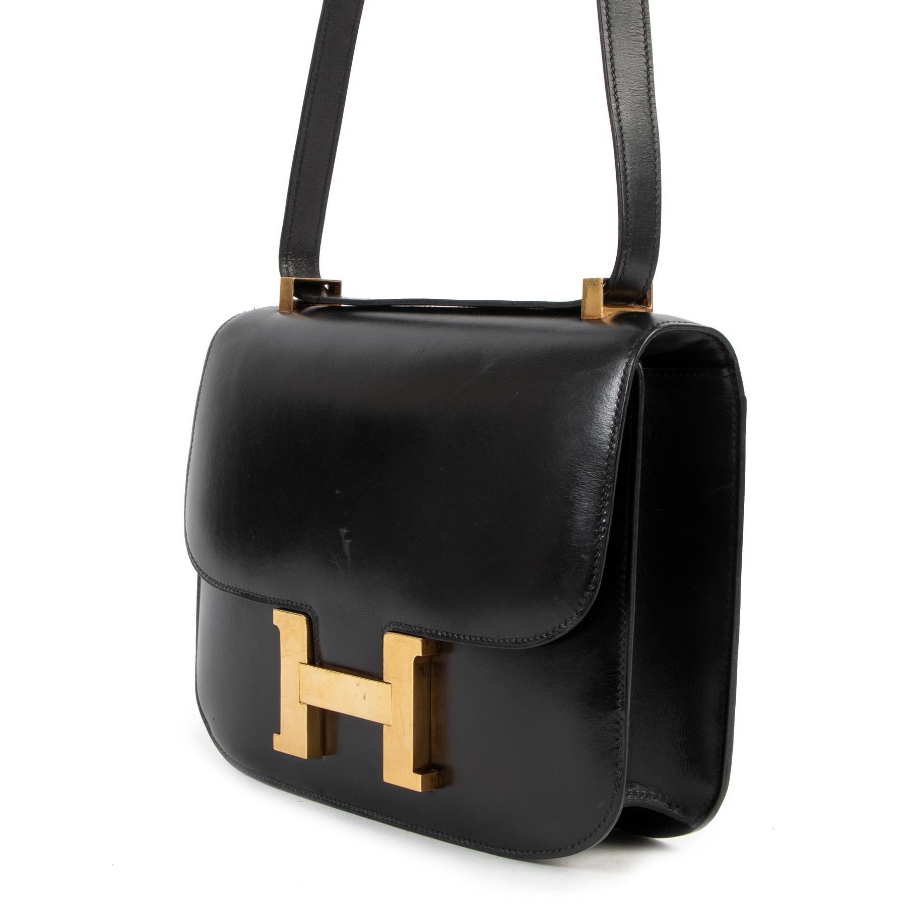 Hermès Vintage Constance 23 Black Box Gold Hardware

Hermès Constance stays one of the most coveted handbag designs in the history and is equally desired as Hermès Birkin and Hermès Kelly bags.

This hard-to-find Hermès Constance 23 is practical and