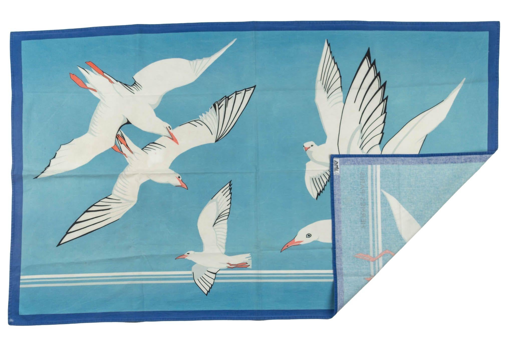 Hermès vintage cotton blue sarong with white seagulls design. Minor stains and wear.