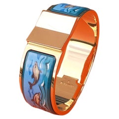 Hermès Vintage Enamel and Yellow Gold Hardware Clic Clac Bracelet Dolphins Sea