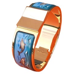 Hermès Retro Enamel and Yellow Gold Hardware Clic Clac Bracelet Dolphins Sea