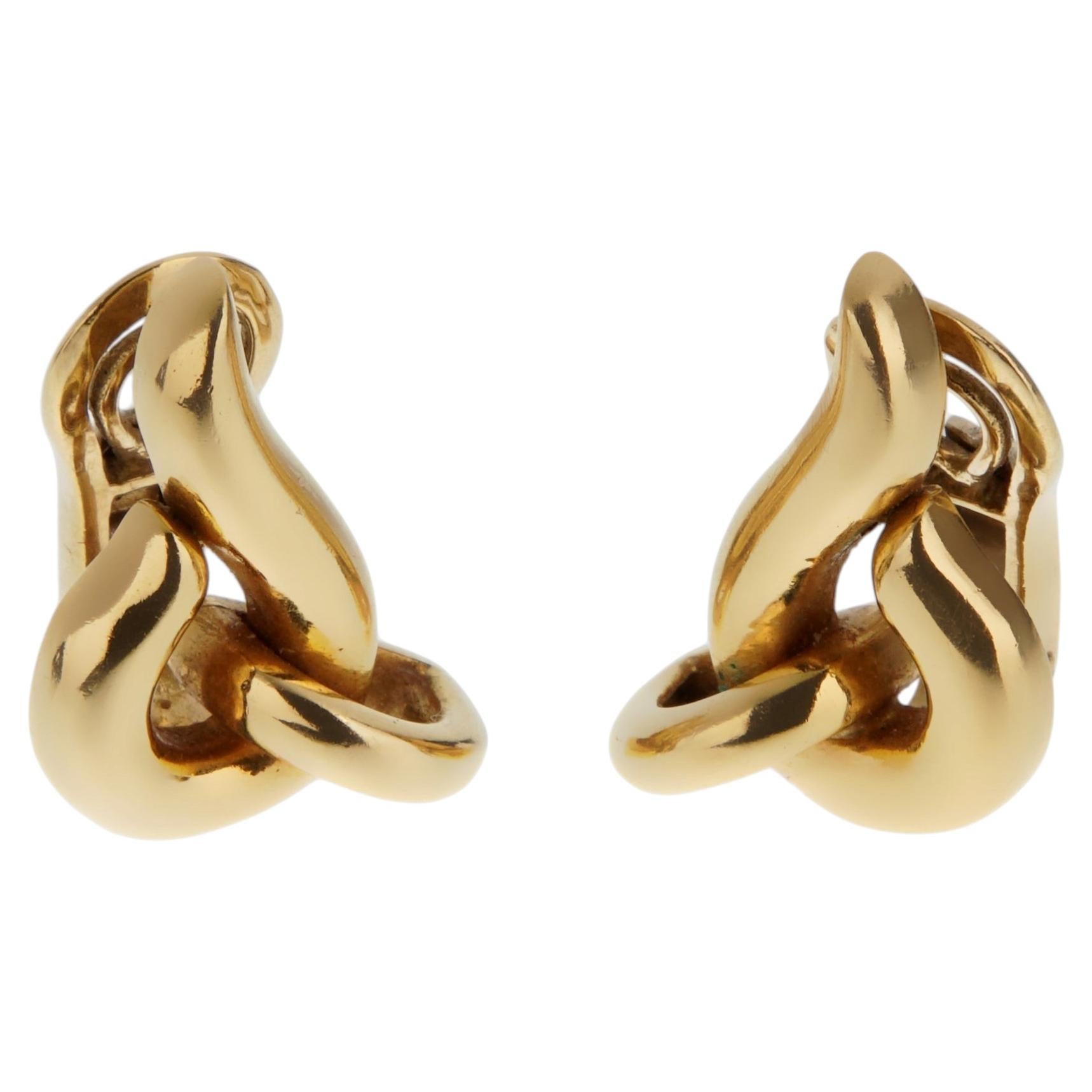 Hermes Vintage Français Boucles d'oreilles clip nœud sculptural en or jaune 18K