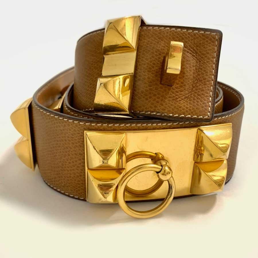 Iconic belt of the HERMES House. The Dog Necklace in gold leather and gold plated metal jewelery. It is a belt of 1978 (letter H in a circle). The size is not specified but is approximately a size 75.
Use this accessory to belt a jacket, dress or