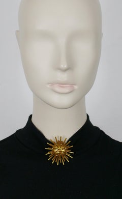 HERMÈS Clip spoutnik bombé vintage de couleur or