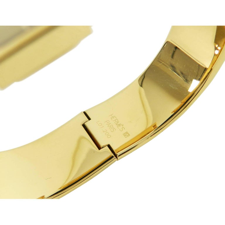 Pre-owned Hermes Women's Loquet Bangle 30mm X 20mm Gold Plated Stainless Steel Wristwatch - L01.201 main image 0