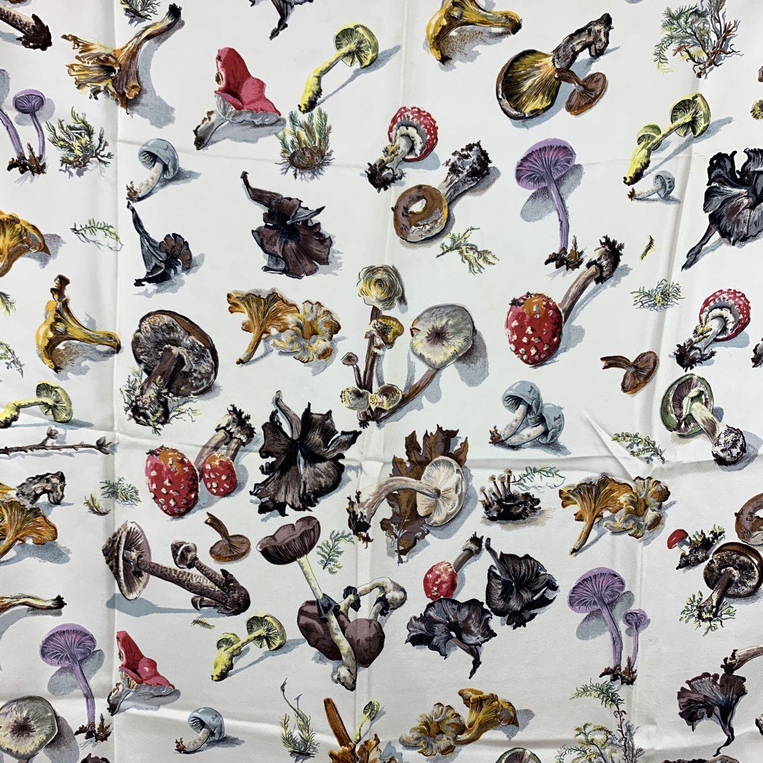 HERMES silk scarf named 'Champignons', designed by Francoise de la Perriere and Anne Gavarni and issued the first time in 1959. It features different types of mushrooms. It has re-issued many times, in different colours, formats and variations of