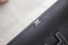 Hermes vintage Jige clutch in brown grained leather