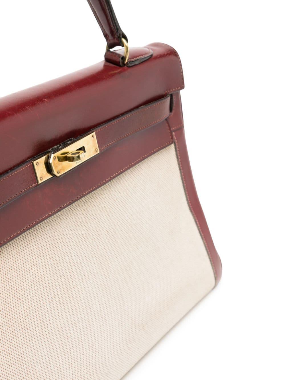 Named after Grace Kelly in 1977, the Kelly bag from Hermès became one of the most sought-after styles in the world. Crafted from smooth leather and canvas with gold-tone hardware, the handbag became famous as Princess Grace Kelly constantly matched