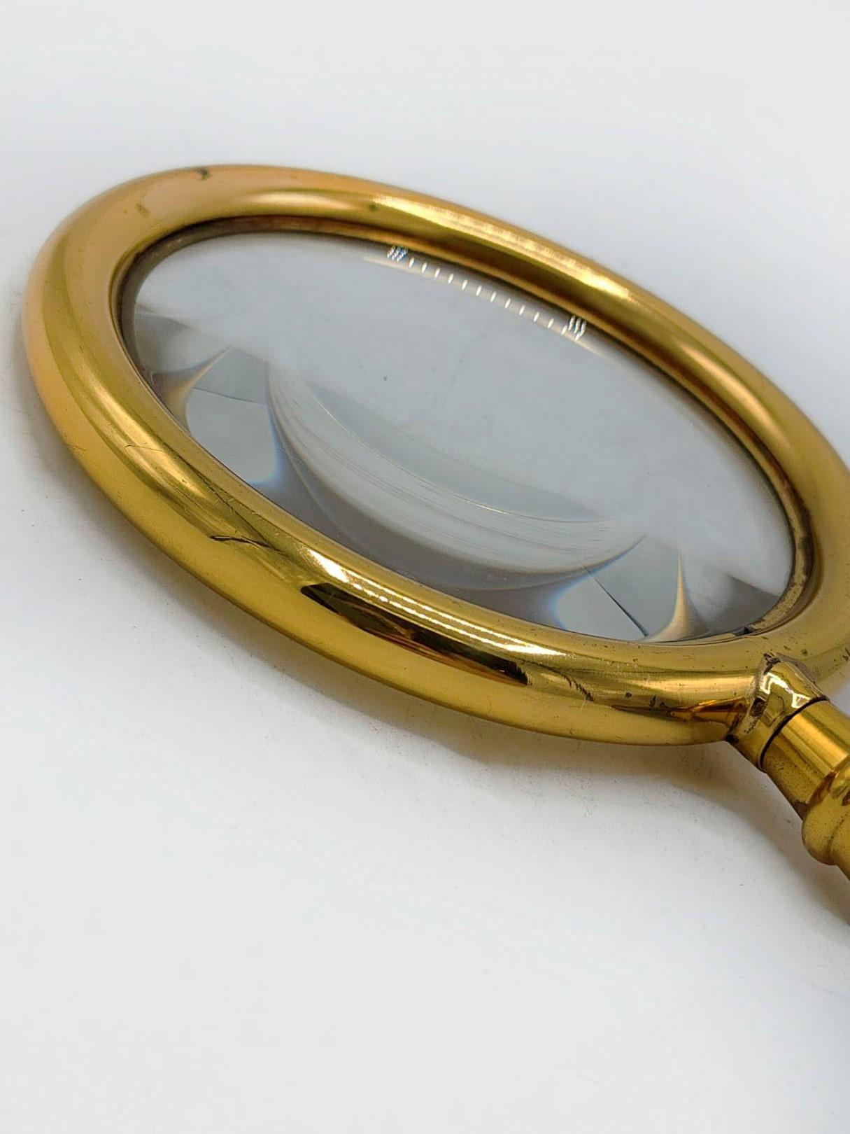Vintage Hermes Leather and Bronze Desk Magnifying Glass

Elegant gilt bronze magnifying glass with black leather handle stamped Hermes Paris from the Art Deco style, 20th Century

Measures:
Height: 22 centimeters
Diameter: 10 centimeters
​