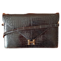 Hermès Retro Lydie Bag Clutch 2 ways Black Shiny Crocodile Golden Hdw