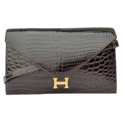 Hermès Vintage Lydie Bag Clutch 2 ways Brown Shiny Crocodile Golden Hdw