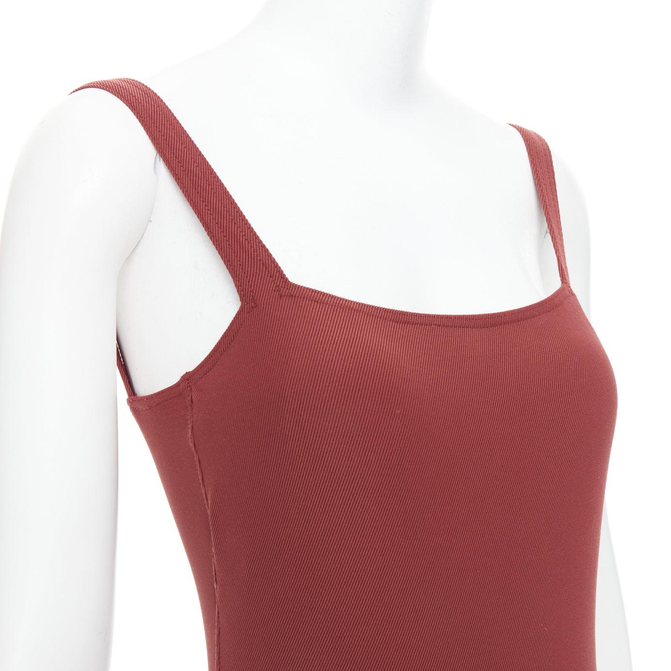 HERMES VINTAGE Martin Margiela burnt orange twill jersey one piece bodysuit FR40 L
Reference: CNLE/A00363
Brand: Hermes
Designer: Martin Margiela
Material: Polyamide, Blend
Color: Burgundy
Pattern: Solid
Closure: Slip On
Lining: Burgundy