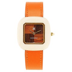 Hermès Vintage One-of-a-Kind Gold, Mahogany, Bone watch on orange leather strap