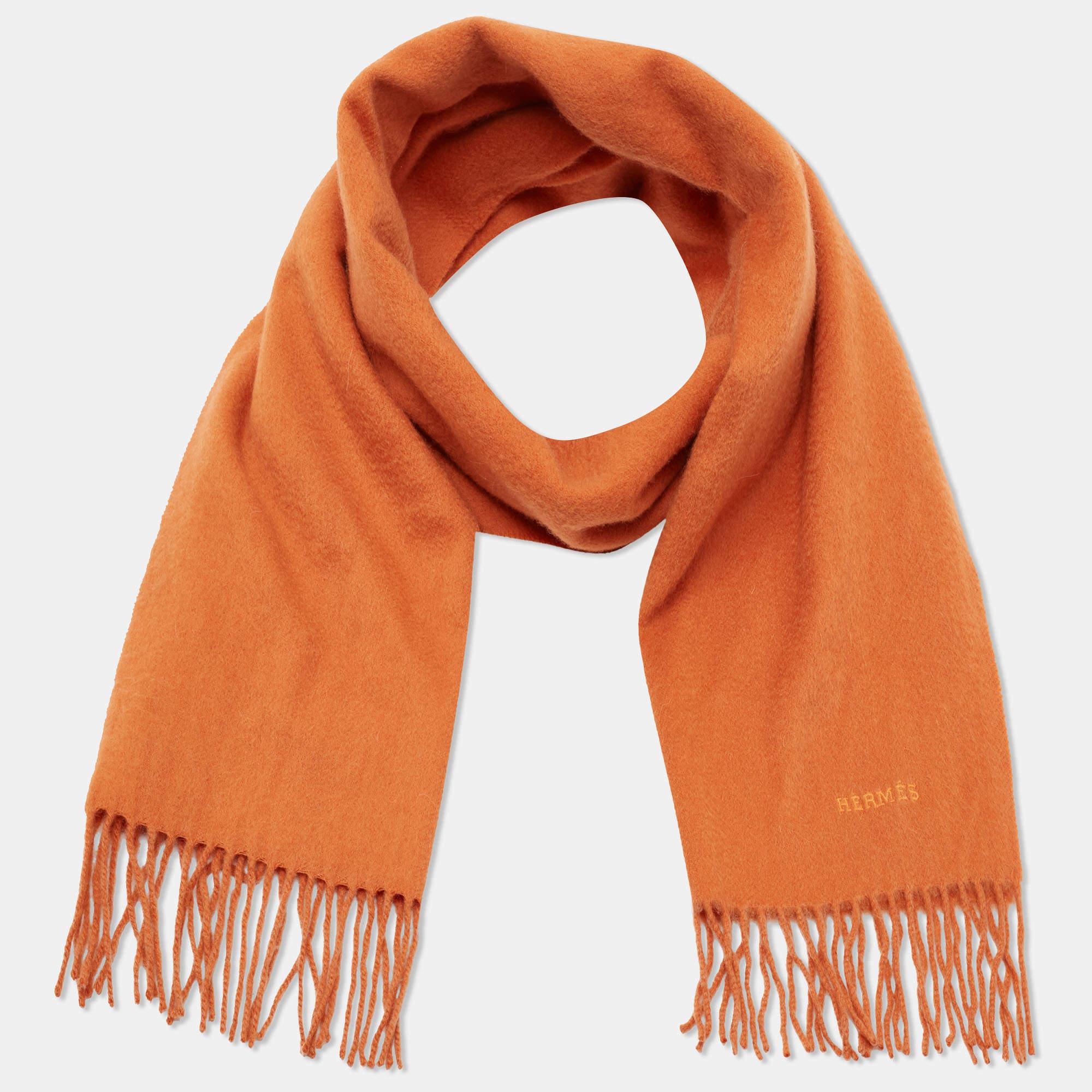 Grand in orange, this Hermes stole aims to be a fashionable style companion for winter. It is made of luxurious cashmere and sized to complement an evening dress or a day outfit.

