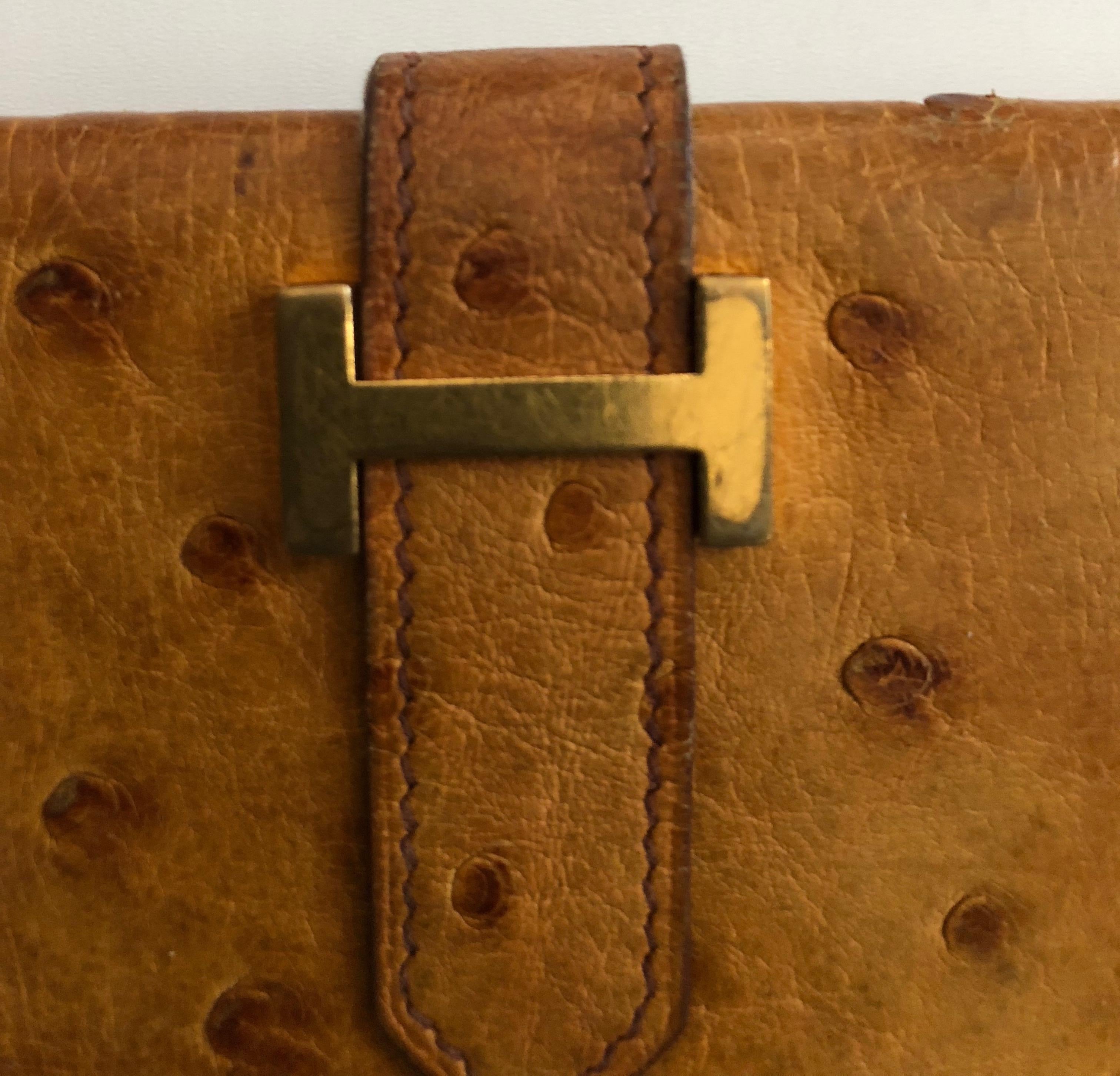 Beautiful and rare vintage Hermes wallet.Presented here is beautiful Hermes wallet fro the early 1980's The closure is the iconic  H in a brass tone with minor signs wear which are visible on the photo.  The half inch wide closer strap measures four