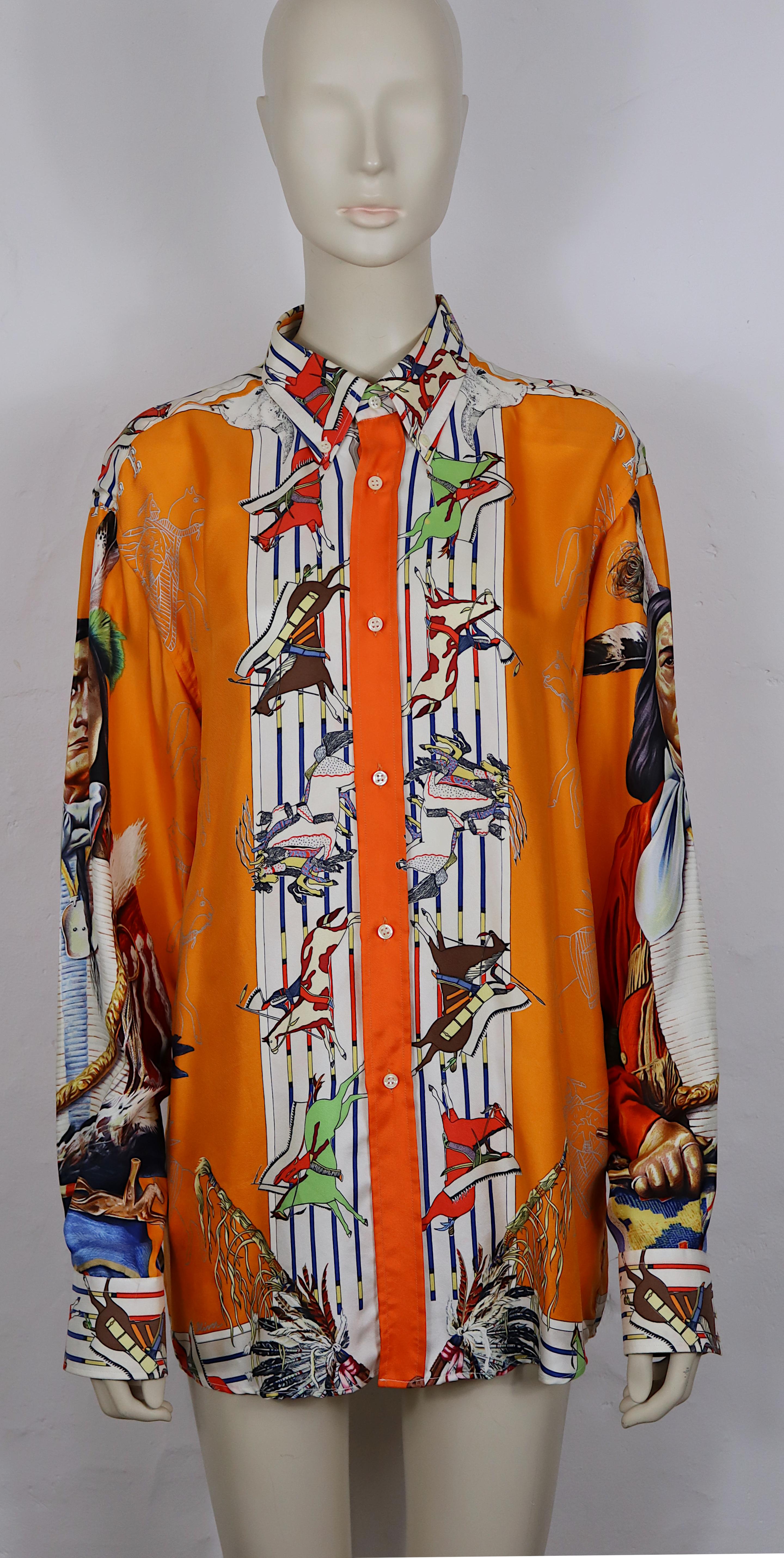 HERMES vintage Native American Indian print silk shirt PANI LASHAR PAWNEE designed by Texan artist KERMIT OLIVER.

Label reads HERMES Paris Exclusif Made in France.

Size label reads : 40.
Please check measurements.

Composition label reads : 100 %
