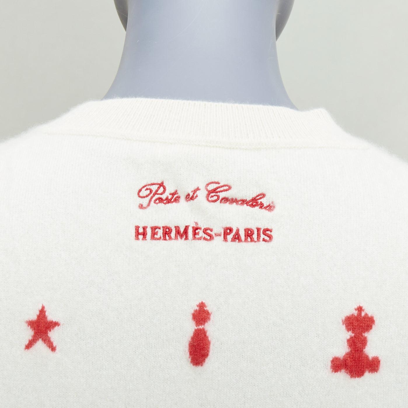 HERMES Vintage Poste et Cavalerie 100% cashmere cream embroidered sweater FR40 L
Reference: KYCG/A00081
Brand: Hermes
Model: Poste et Cavalerie
Material: 100% Cashmere
Color: Cream, Red
Pattern: Abstract
Closure: Pullover
Extra Details: Logo at