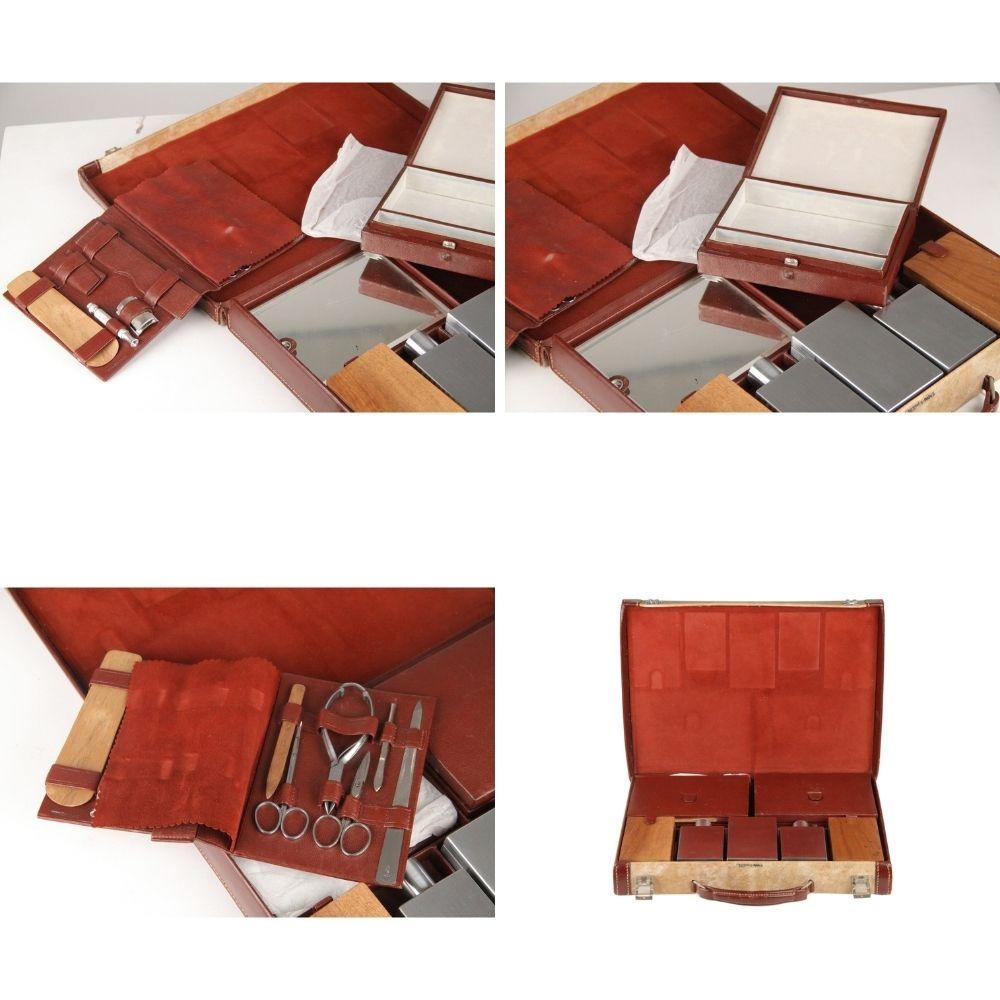 HERMES Paris 50's Gentleman travel grooming set. Case with handle in beige leather with brown trim and handle. Double latch closure. The case is lined in suede and leather. 'HERMES Paris - Made in France' embossed on the case leather on the front,