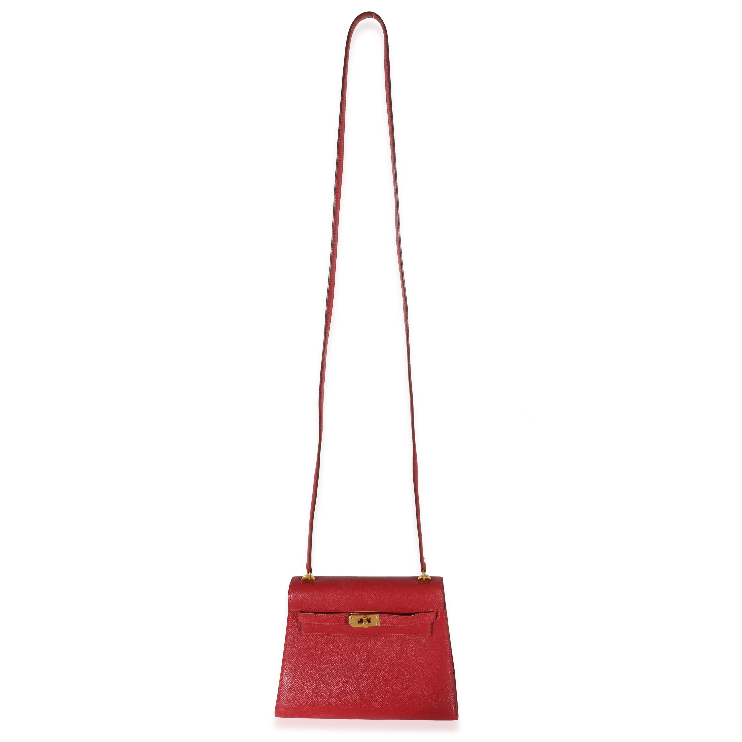 Listing Title: Hermes Vintage Rouge Vif Courchevel Mini Sellier Shoulder Kelly 20 GHW
SKU: Z130769
Condition: Pre-owned 
Condition Description: Officially renamed in 1977, the Kelly tote bag from Hermès was originally called the Sac à Dépêches