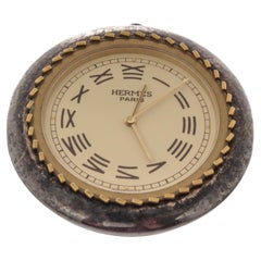 Hermes Vintage Round Pocket Watch features roman numerals, brass frame
