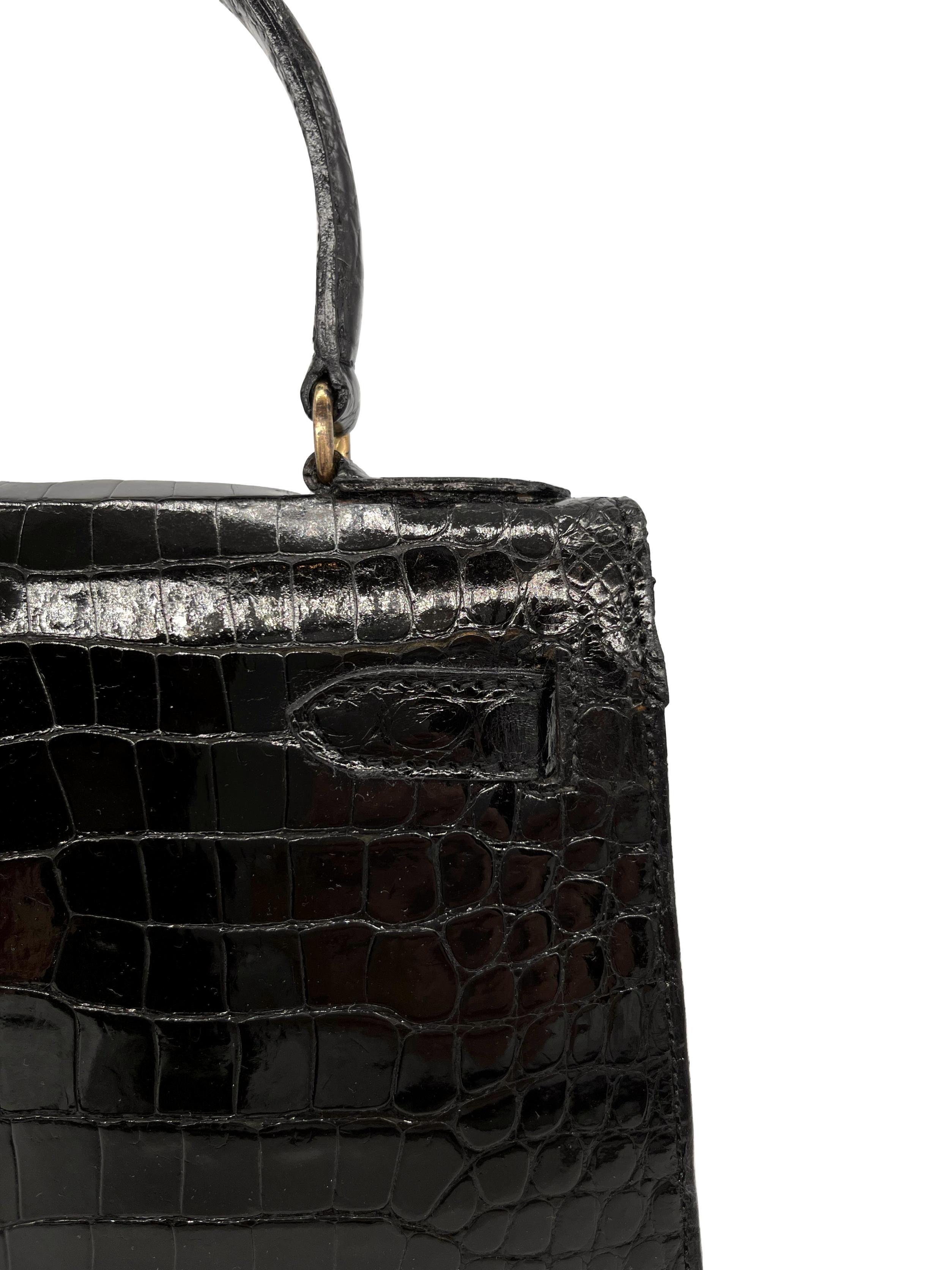 Hermès Kelly Bag aus glänzendem schwarzem Porosus-Krokodil mit Goldbeschlägen 28, 1940. im Angebot 13