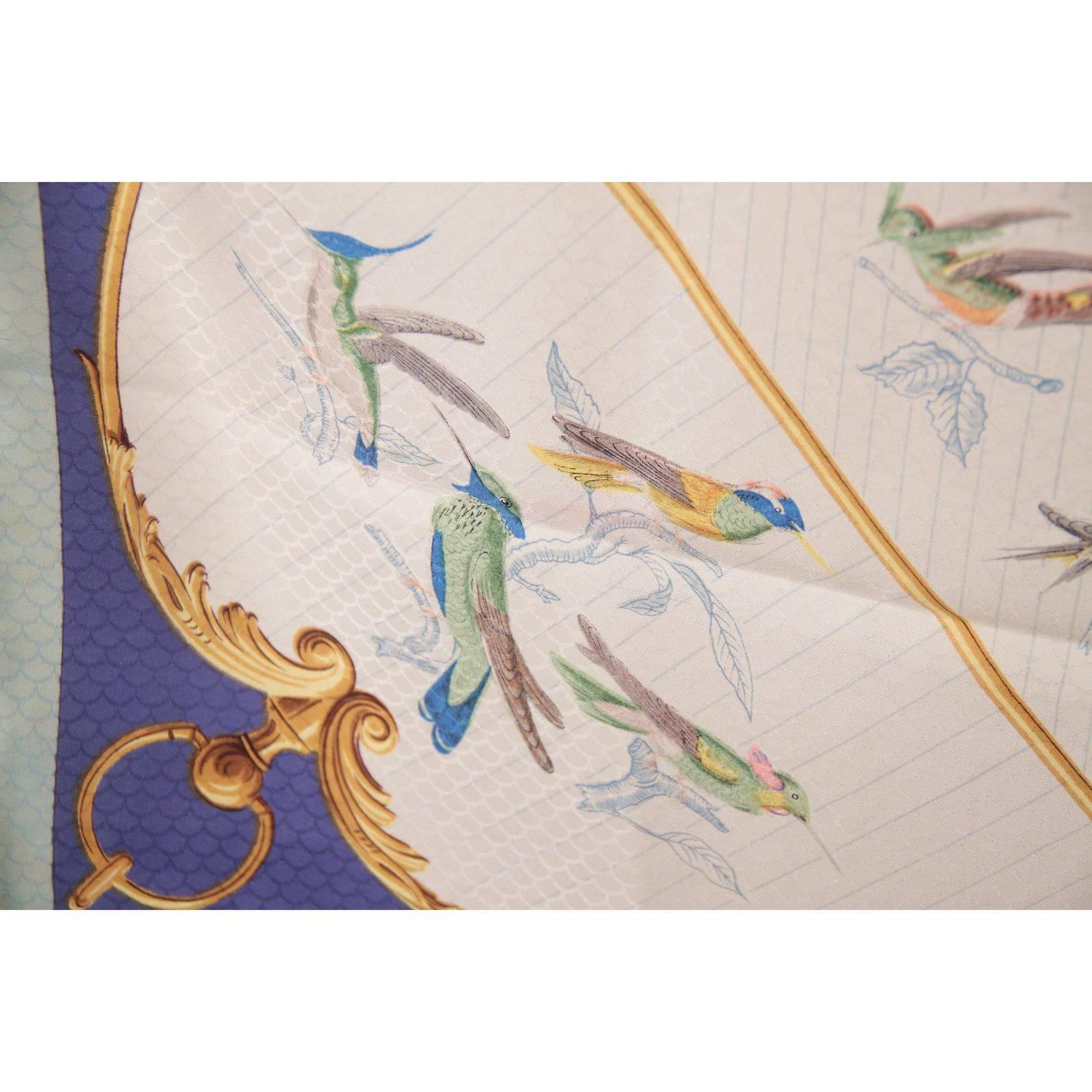 - Title: La Voliere des Dames, by Hugo Grygkar and first issued in 1958
- 100% Jacquard Silk
- Jacquard silk ground and birds scenic print
- Approx. Measurements: 35 x 35 inches - 89 x 89 cm
- 'Hermes Paris' printed in the center

MATERIAL:

100%