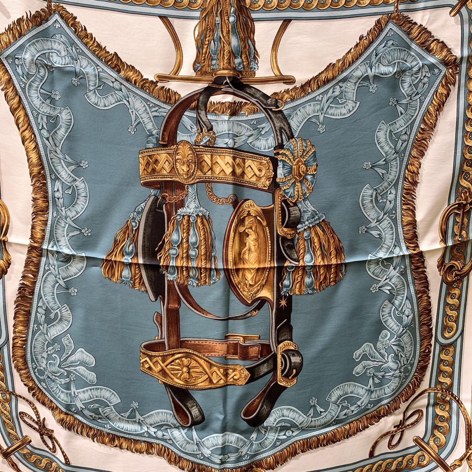 HERMES silk scarf named Bride de Cour . Designed by Françoise de la Perriere in 1969. It was re issued many times in different colors, types and sizes. Hand rolled edges . Measurements: Approx 35 x 35 inches. 'HERMES PARIS' printed in the lower