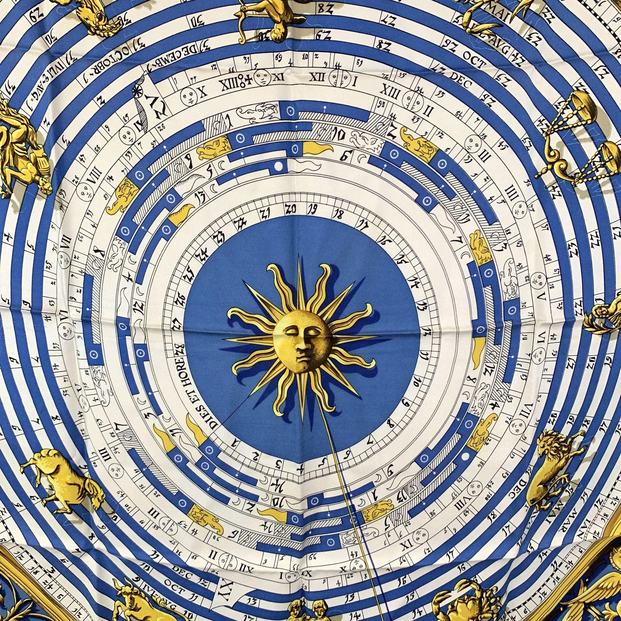 Step into the world of luxury and timeless design with this HERMES silk scarf, named 'Astrologie' (also known as 'Dies et Hore'), originally designed by Françoise Faconnet in 1963. This iconic piece, renowned for its intricate detailing and