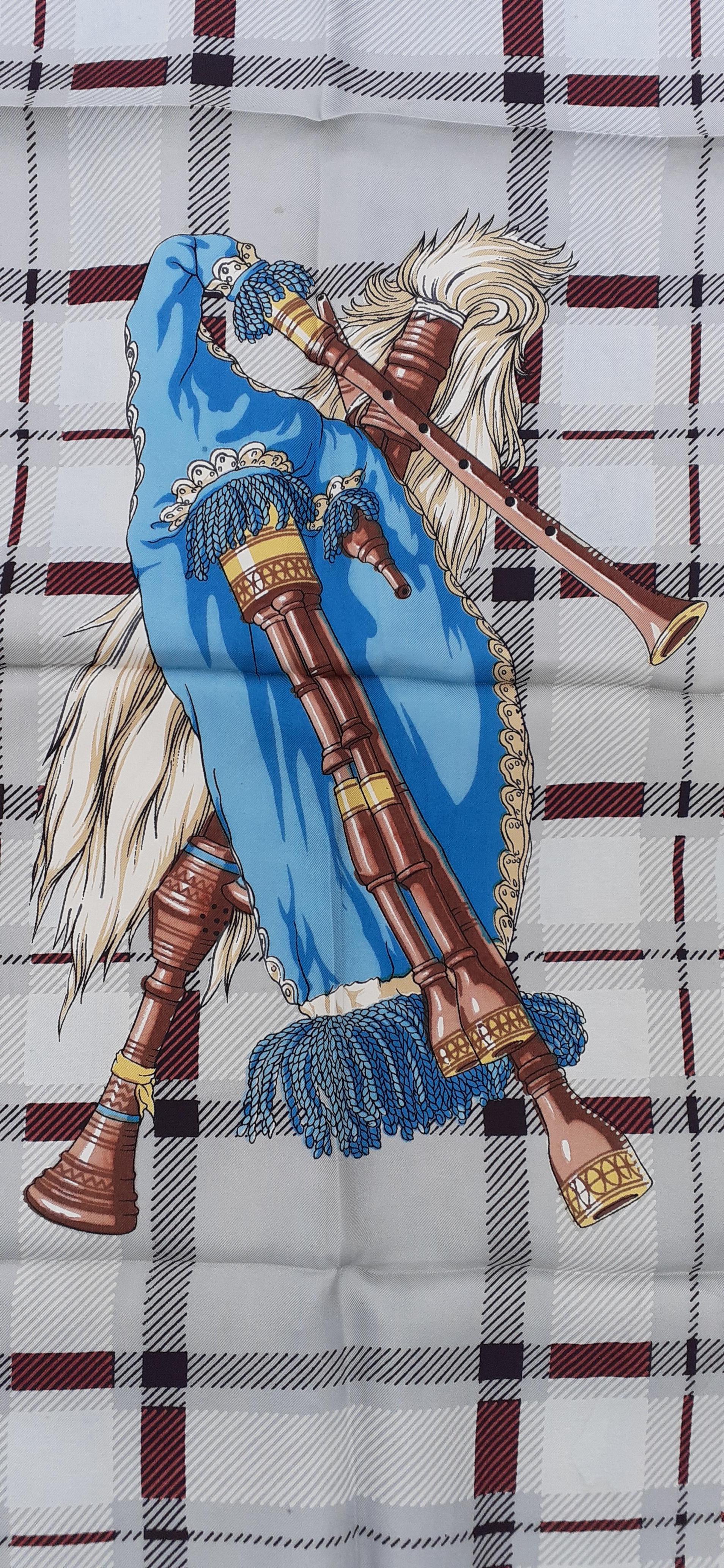 Extremely Rare Authentic Hermès Scarf

Pattern: Bagpipe (Cornemuse)

The drawing shows in its center a bagpipe, surrounded by 4 hands each holding a flower, emblem of the countries of the United Kingdom: Rose for England, Clover for Northern