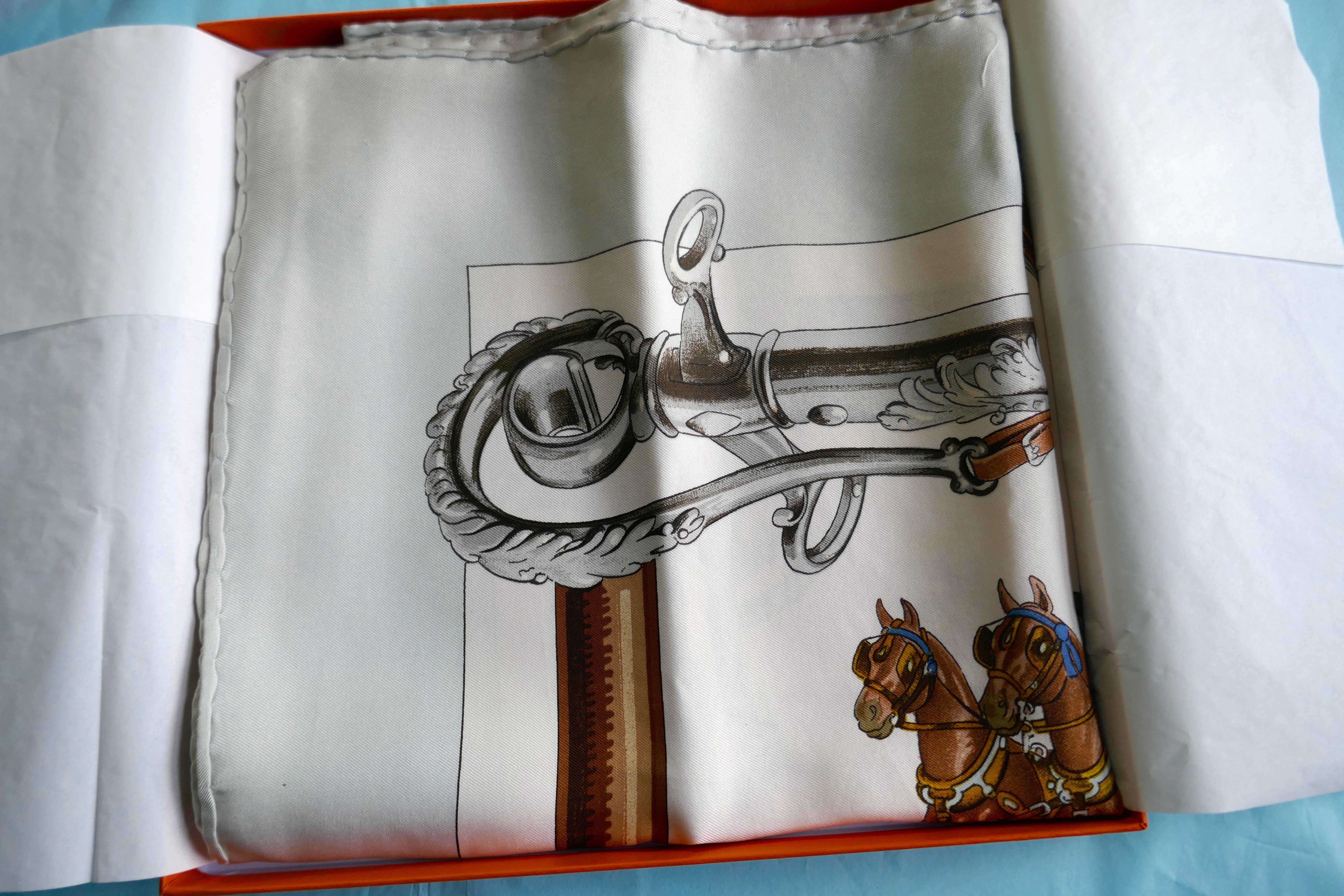 Hermes Vintage Silk Scarf “EQUIPAGES” by Philippe Ledoux,

Beautiful condition has been kept folded since new “EQUIPAGES” by Philippe Ledoux Horse Carriage Driving
The highest quality silk which makes the scarf extra durable. 
Duck Egg Blue Border