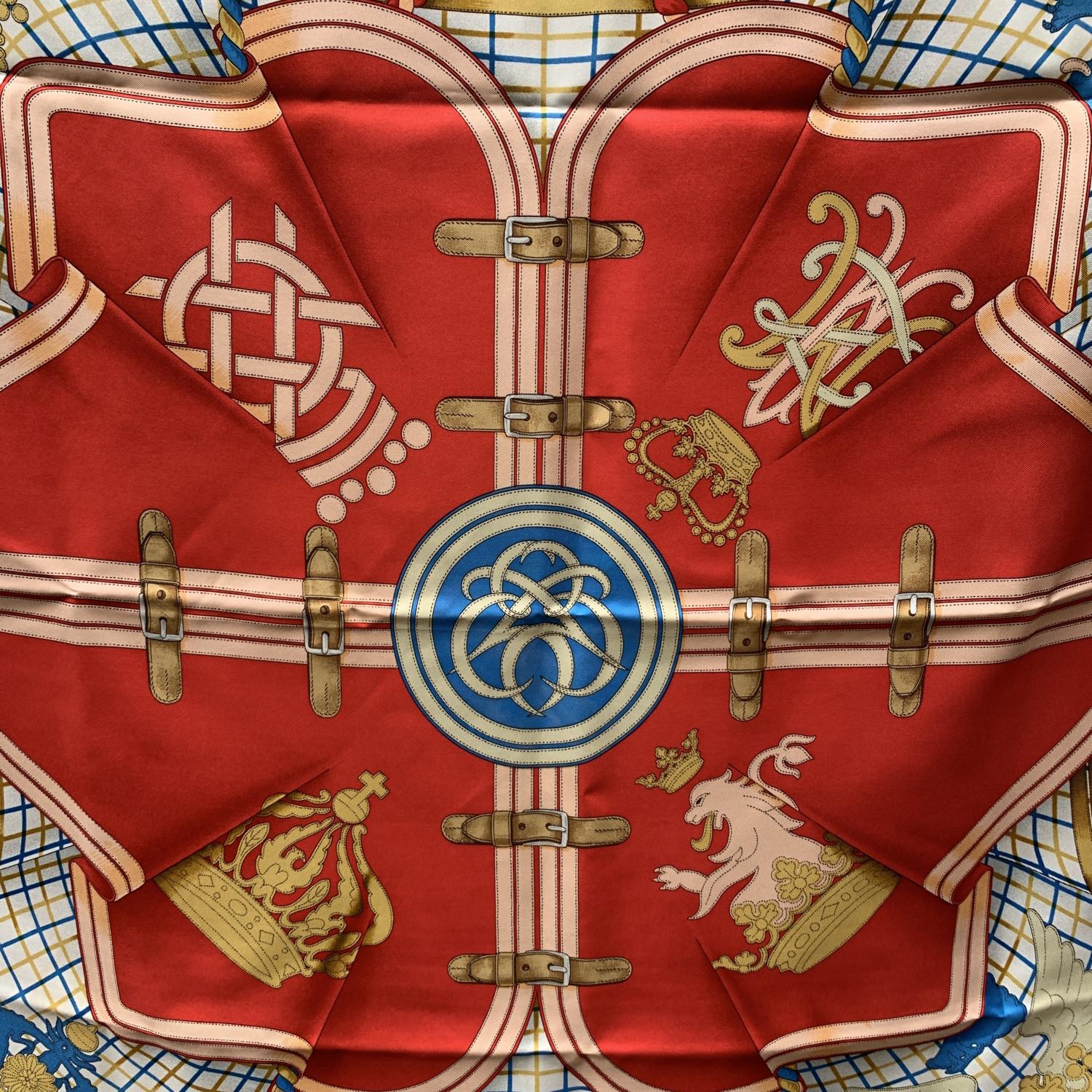 HERMES Silk scarf named 'Grande Tenue', designed by artist Henry D'Origny and issued for the first time in 1993. Black borders. 'Hermes Paris' and 'Hermes with copyright symbol printed on the scarf. Hermes composition tag is still attached. Approx.