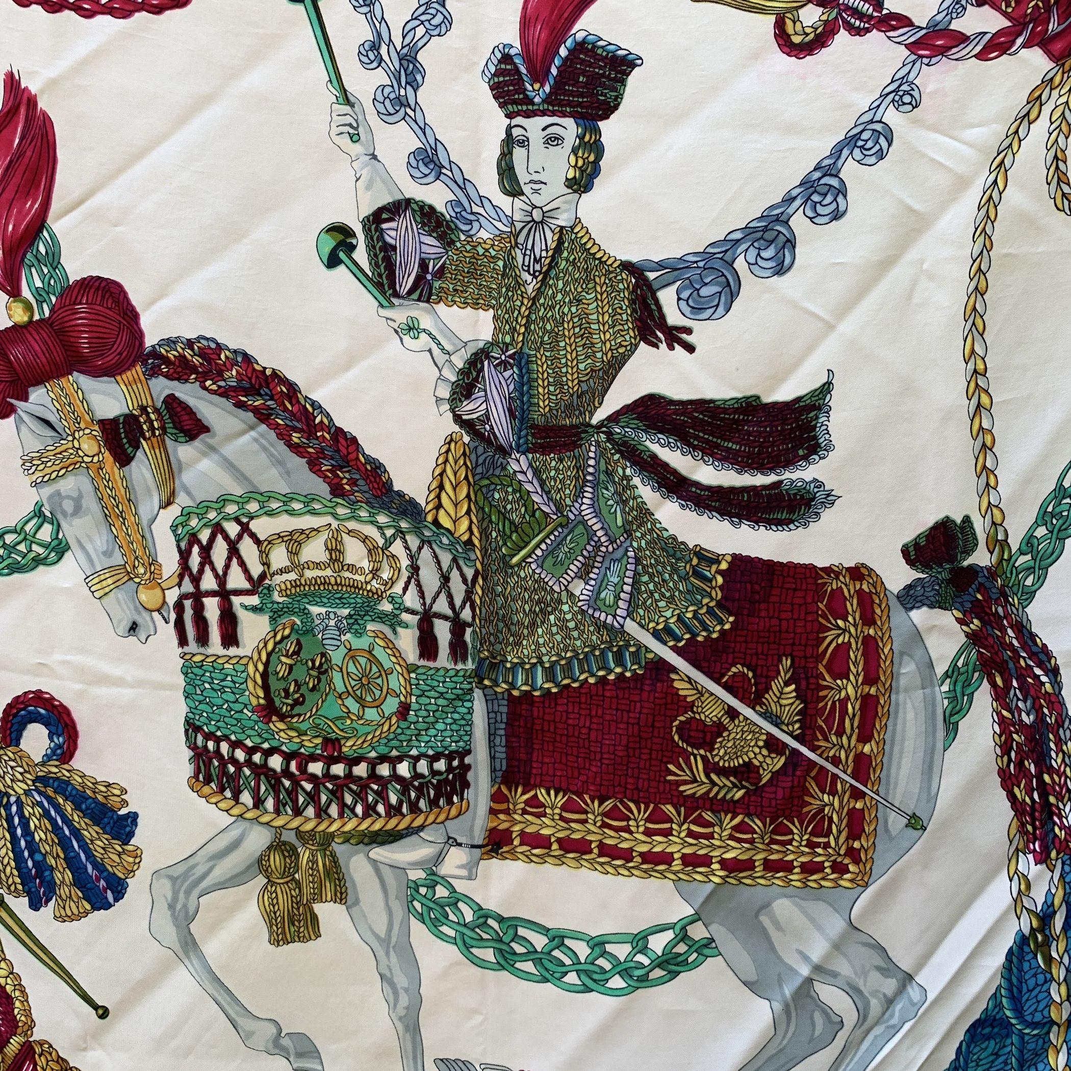 Rare Hermes 'LE TIMBALIER' silk scarf, designed by Francoise Heron and originally issued in 1961. It has re-issued many times (in 2001, in 2010, in 2011), in different colours, formats and variations of. Pictured is the 'Timbalier', or timpanist, in