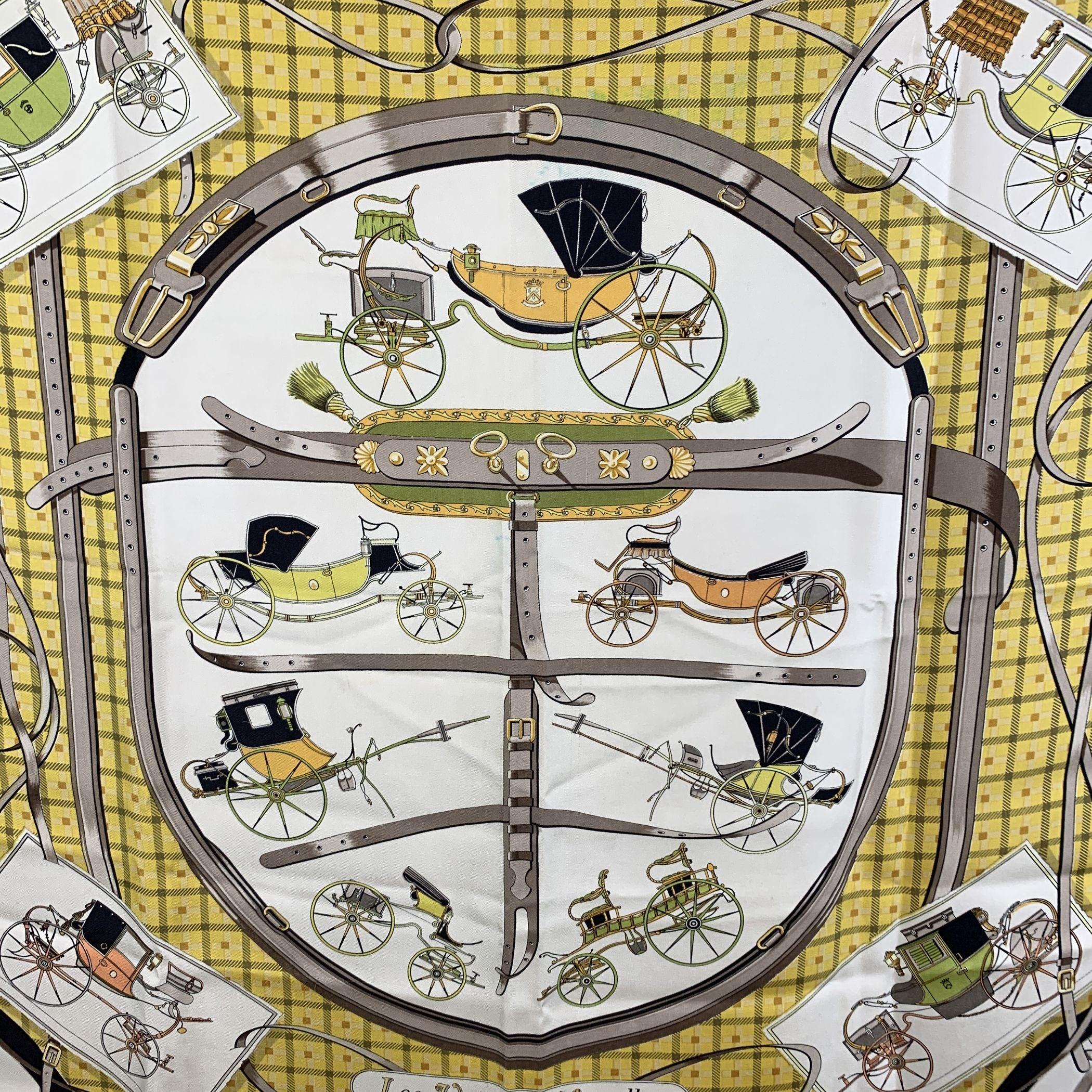 HERMES PARIS vintage silk scarf 'LES VOITURES NOUVELLES' designed by y Jacques EUDEL and issued for the first time in 1961. Hand-rolled hem. Fabric / Material: 100% silk. Coaches design . Main colors are white, yellow, black. Approx. Measurements: