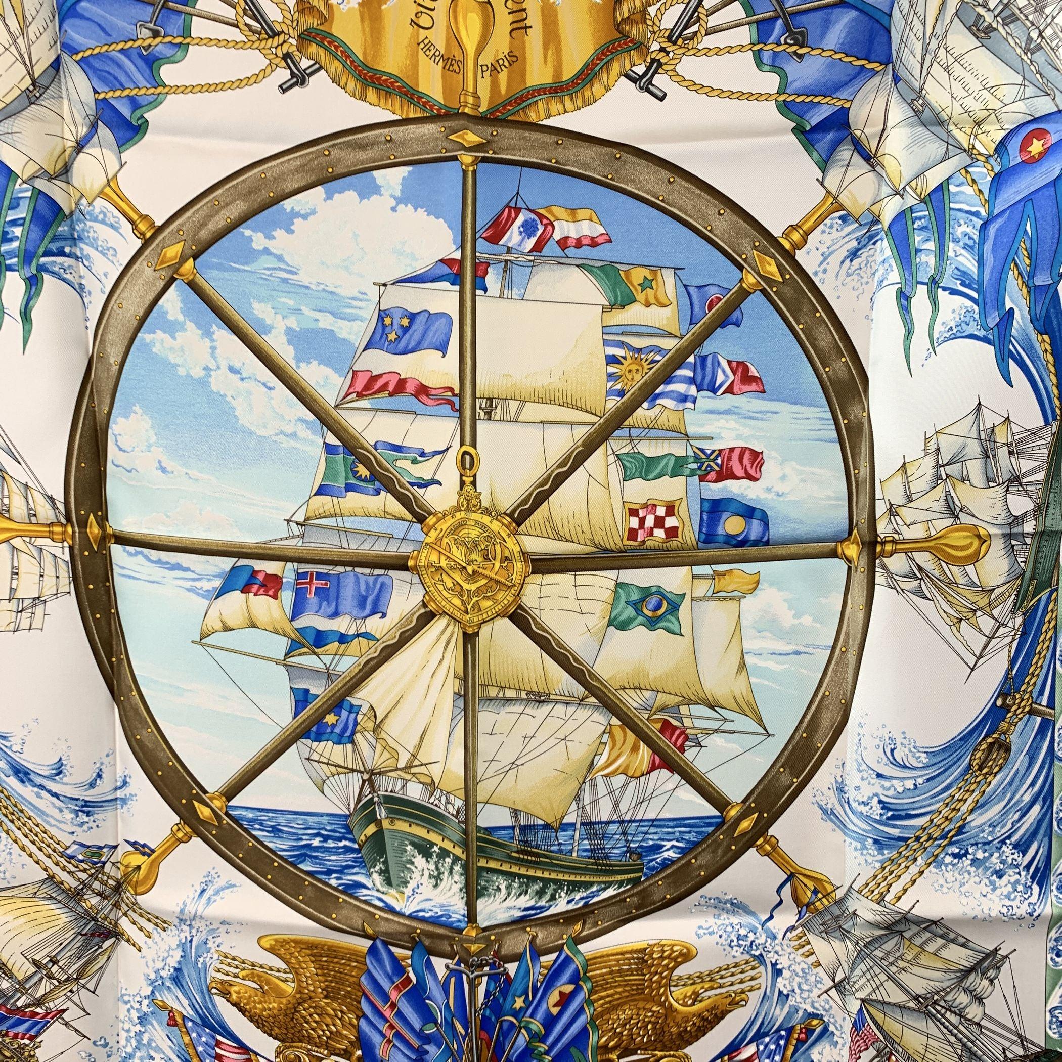 Embrace the spirit of adventure with the 'Vive Le Vent' silk scarf, designed by the talented Toutsy (also known as Laurence Thioune and Laurence Bourthoumieux) as part of Hermès' 1992 Year by the Sea collection. This stunning Carré 90 scarf captures