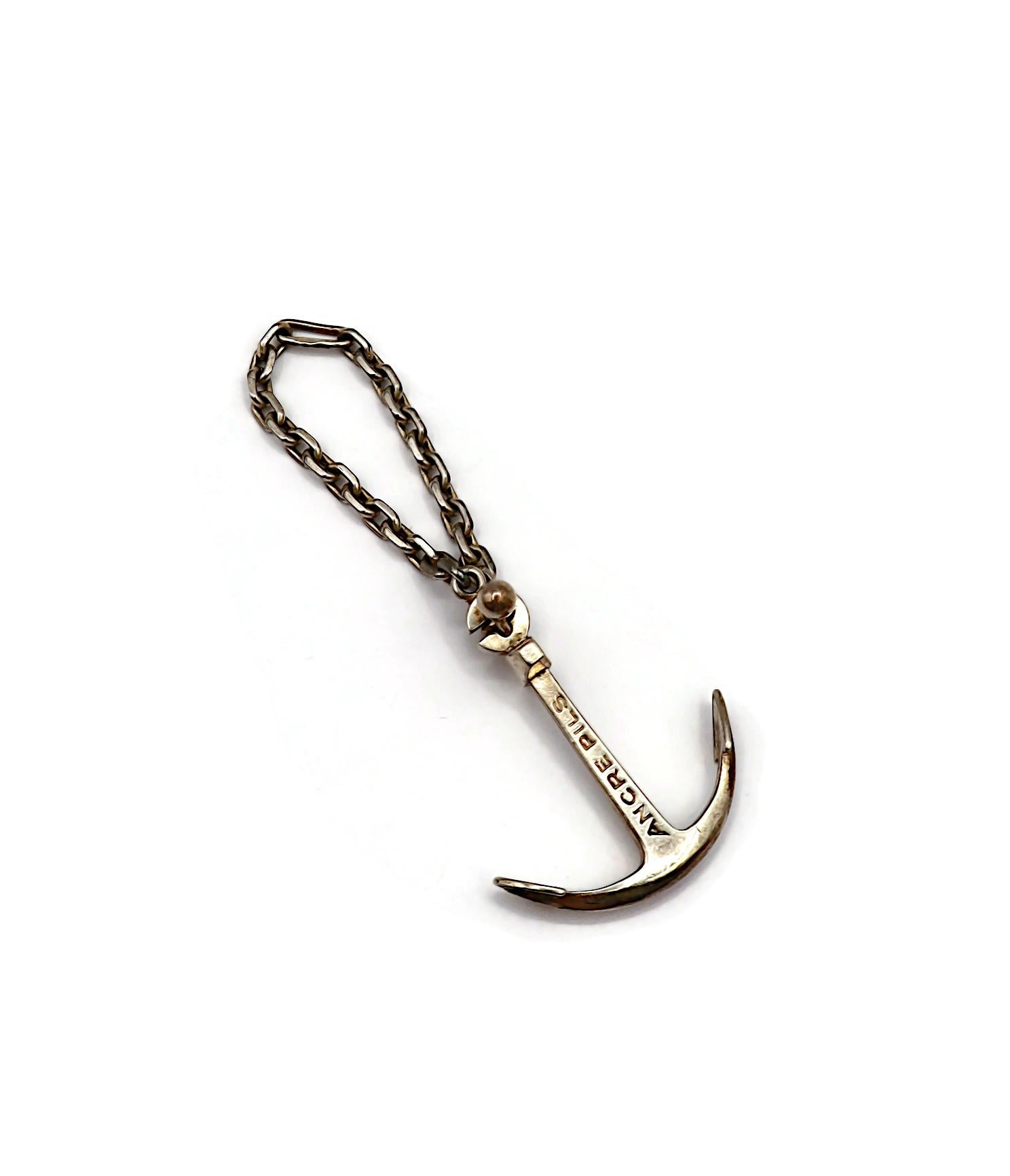 HERMES Vintage Silber Boot Anker Schlüsselanhänger.

Werbeartikel für Ancre Pils (das erste Bier, das in der 1746 gegründeten Brasserie de l'Espérance in Straßburg gebraut wurde).

Geprägte HERMES und ANCRE PILS.
Französische Silberkrabbenpunzen