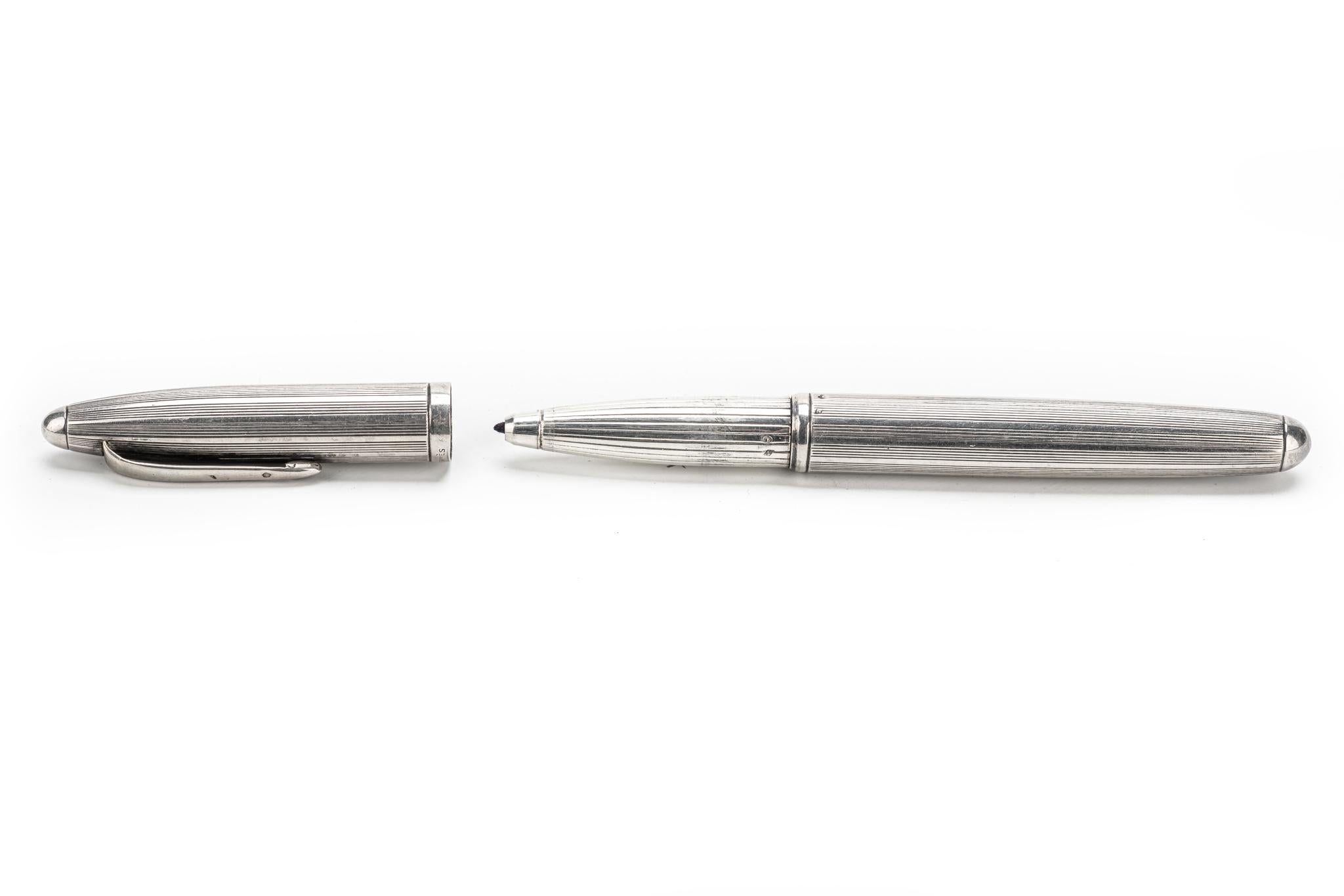 Hermes silver vintage ballpoint pen. Numbered piece. Comes with brand new blue ink refill. Comes with Hermes gift bag.