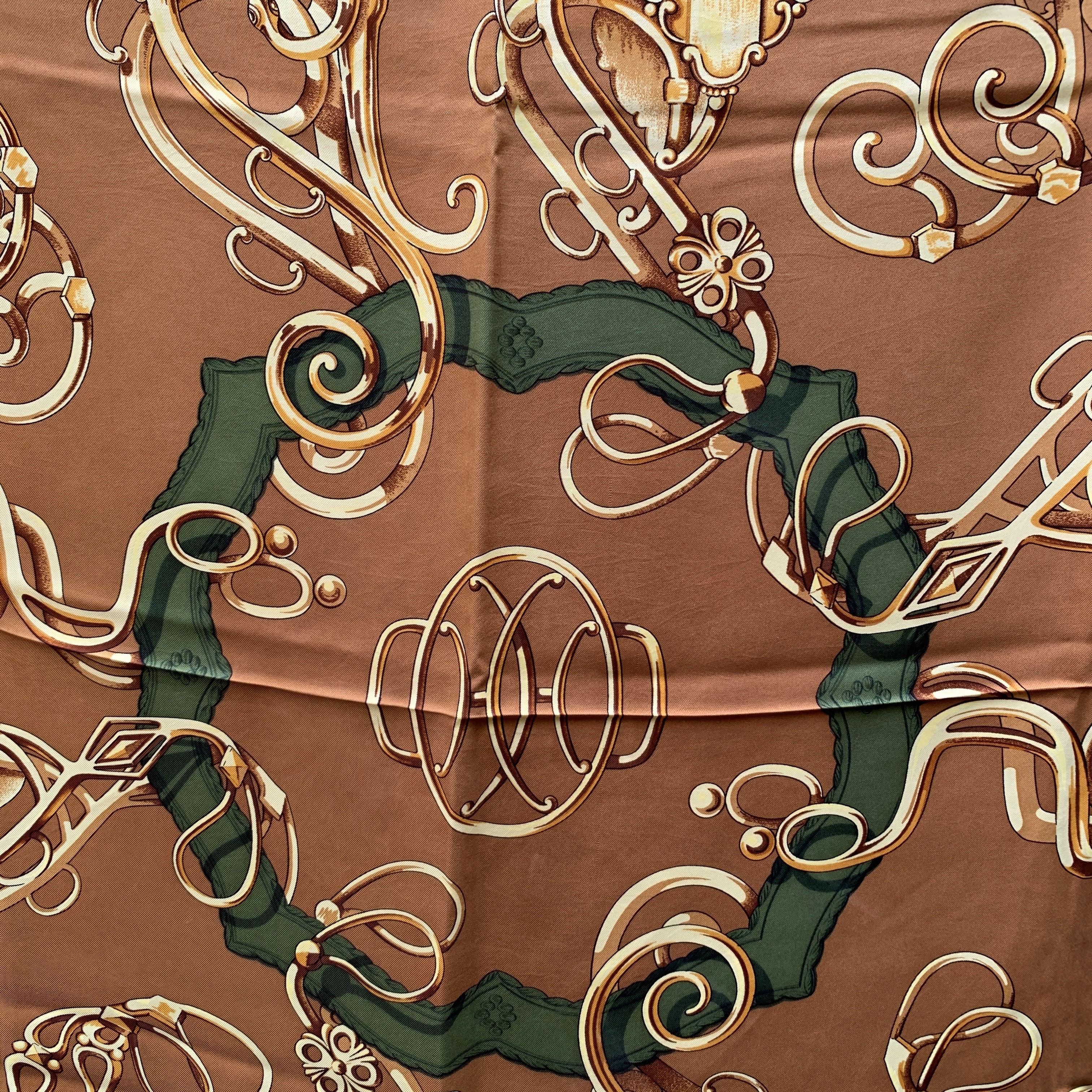 HERMES scarf 'Profile Selliere ' by Maurice Guillemot, originally issued in 1974 and reissued in 1984.Equestrian theme in a tan colorway. The 'Hermes Paris' logo is located on the center bottom Details MATERIAL: Silk COLOR: Beige MODEL: Profile